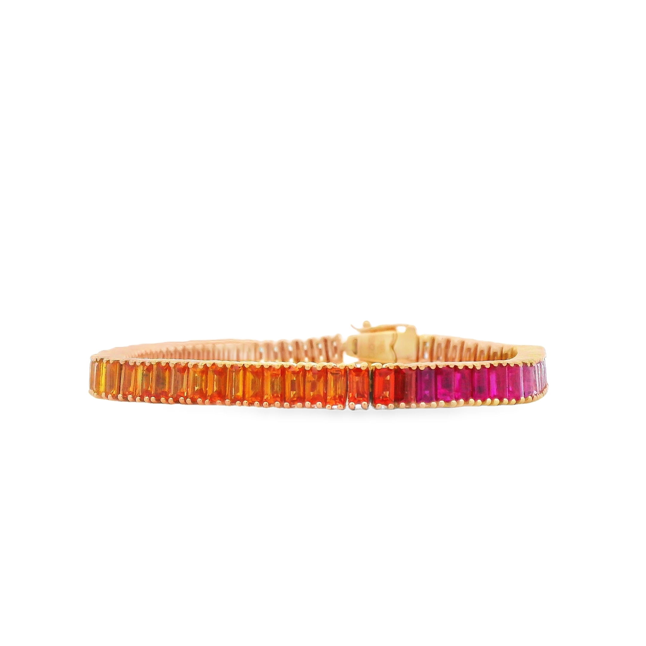 Set in radiant 18k yellow gold, this vibrant tennis bracelet features 10.53cts of rainbow-colored baguette sapphires. The sleek, modern design and bold spectrum of color make it a striking piece that adds joyful elegance to any jewelry collection.-18k Yellow gold-Multicolor baguette sapphires, 10.53cts-Diamond, F-G/VS 0.12cts-Length 7"Item# 240-2000030 Rainbow Sapphire Tennis Bracelet