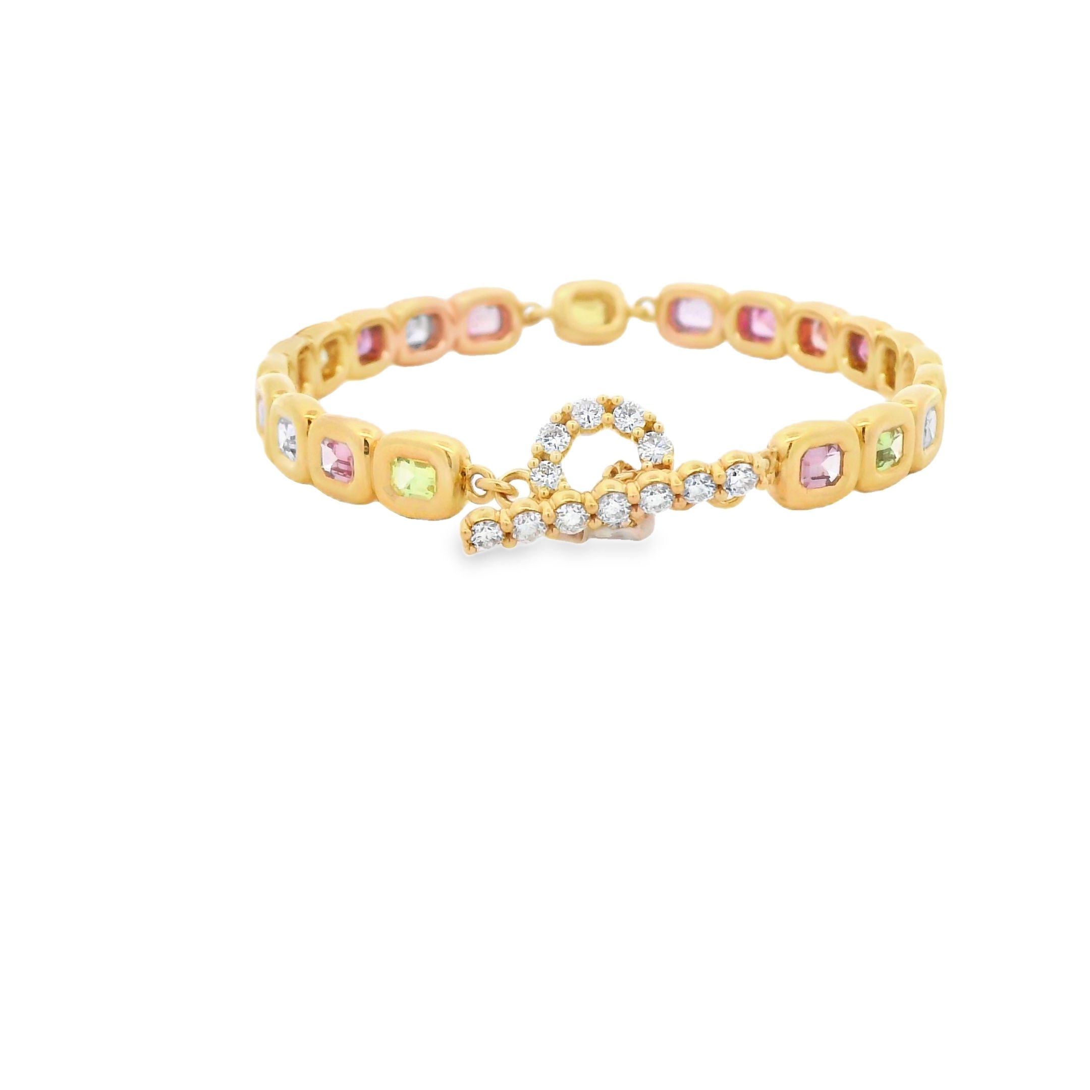 This 18k yellow gold cuff bracelet showcases 4.83cts of subtle, multicolor sapphires in a sleek, modern design. Finished with a beautiful diamond toggle clasp, it’s a bold yet elegant statement piece that blends color, craftsmanship, and sophistication.-18k Yellow gold -Multicolor emerald cut sapphires, 4.83cts-Diamond, 0.88ctsItem# 240-2000031 Sherri Bracelet with Diamond Toggle