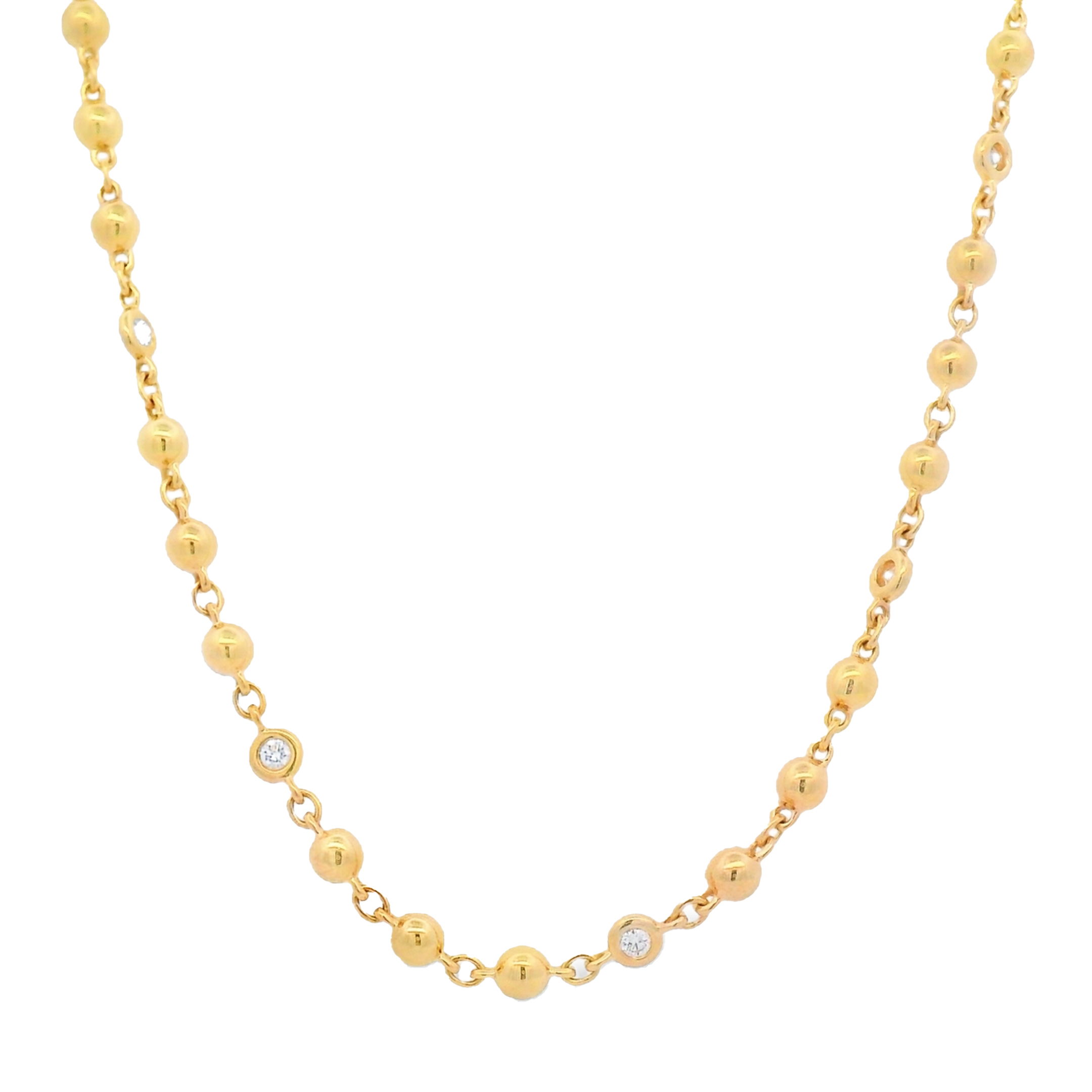Elevate your jewelry collection with this timeless piece crafted in 18K yellow gold. Featuring a sleek ball chain adorned with round bezel-set diamonds, and the statement-making heart-shaped clasp, fully set with pavé diamonds, adds a bold and elegant touch. Designed to stand out—perfect on its own or layered with your favorites. Pendant sold separately. -18k Yellow Gold -Diamonds, F-G/VS, 1.68cts-Length 18" Item# 807-2000379 Gold Ball Chain with Diamond Bezel