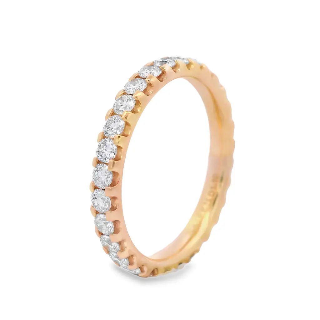 Bold brilliance with timeless appeal. This eternity band is handcrafted in radiant 18K yellow gold and showcases a continuous row of U-prong set diamonds—elevated to catch light from every angle. The open setting maximizes sparkle while maintaining a sleek, modern profile. A striking piece for stacking, celebrating, or simply owning your shine.18k Yellow gold-Round diamonds, 0.98cts-Size 6.5, Contact for sizing optionsItem# 110-2000054 U-Prong Eternity Band