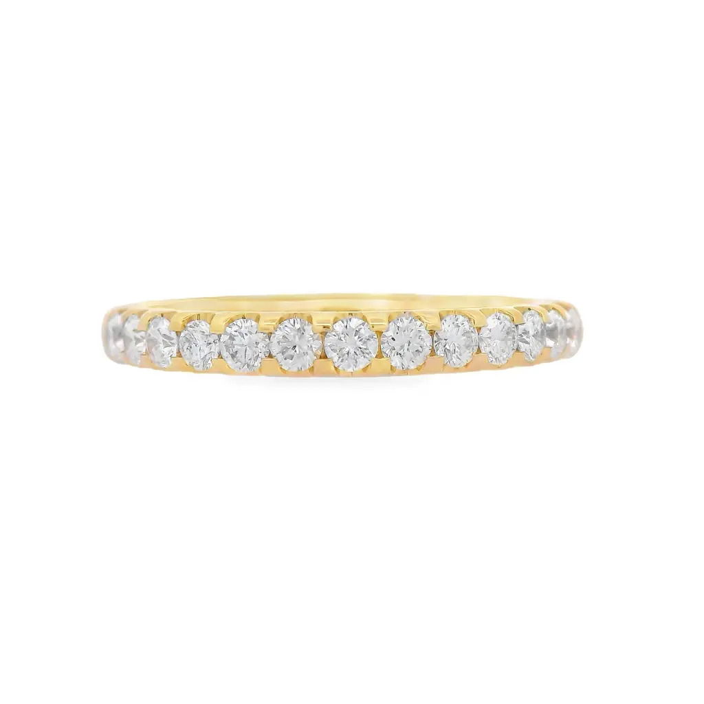 Bold brilliance with timeless appeal. This 1/2 way band is handcrafted in radiant 18K yellow gold and showcases U-prong set round brilliant cut diamonds—elevated to catch light from every angle. The open setting maximizes sparkle while maintaining a sleek, modern profile. A striking piece for stacking, celebrating, or simply owning your shine.18k Yellow gold-Round diamonds, 0.41cts-Size 6.5, Contact for sizing optionsItem# 110-2000057 U-Prong 1/2 Way Band