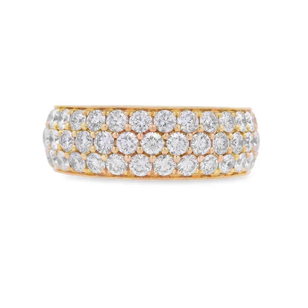 Timeless elegance meets refined craftsmanship in this stunning eternity band. Crafted in rich 18K yellow gold, it features a full circle of pavé-set diamonds, offering continuous sparkle from every angle. Delicate milgrain edging adds vintage-inspired charm and texture, enhancing its classic silhouette. Perfect as an anniversary band, stacking ring, or a meaningful gift.18k Yellow gold-Round diamonds, 2.82cts-Size 6.5, Contact for sizing optionsItem# 110-2000061 Pavé Eternity Band