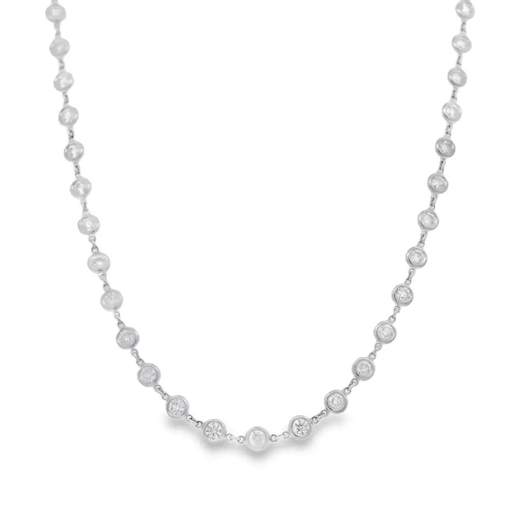 This stunning 14K white gold necklace features a delicate design adorned with sparkling details. Each element is meticulously crafted to catch the light, making it a perfect accessory for any occasion. Whether you're dressing up for a formal event or adding a touch of elegance to your everyday look, this necklace is sure to impress.-14k White gold-Round diamonds, 5.18cts-Length, 18"Item# 165-2000064 Diamonds-By-The-Yard Necklace
