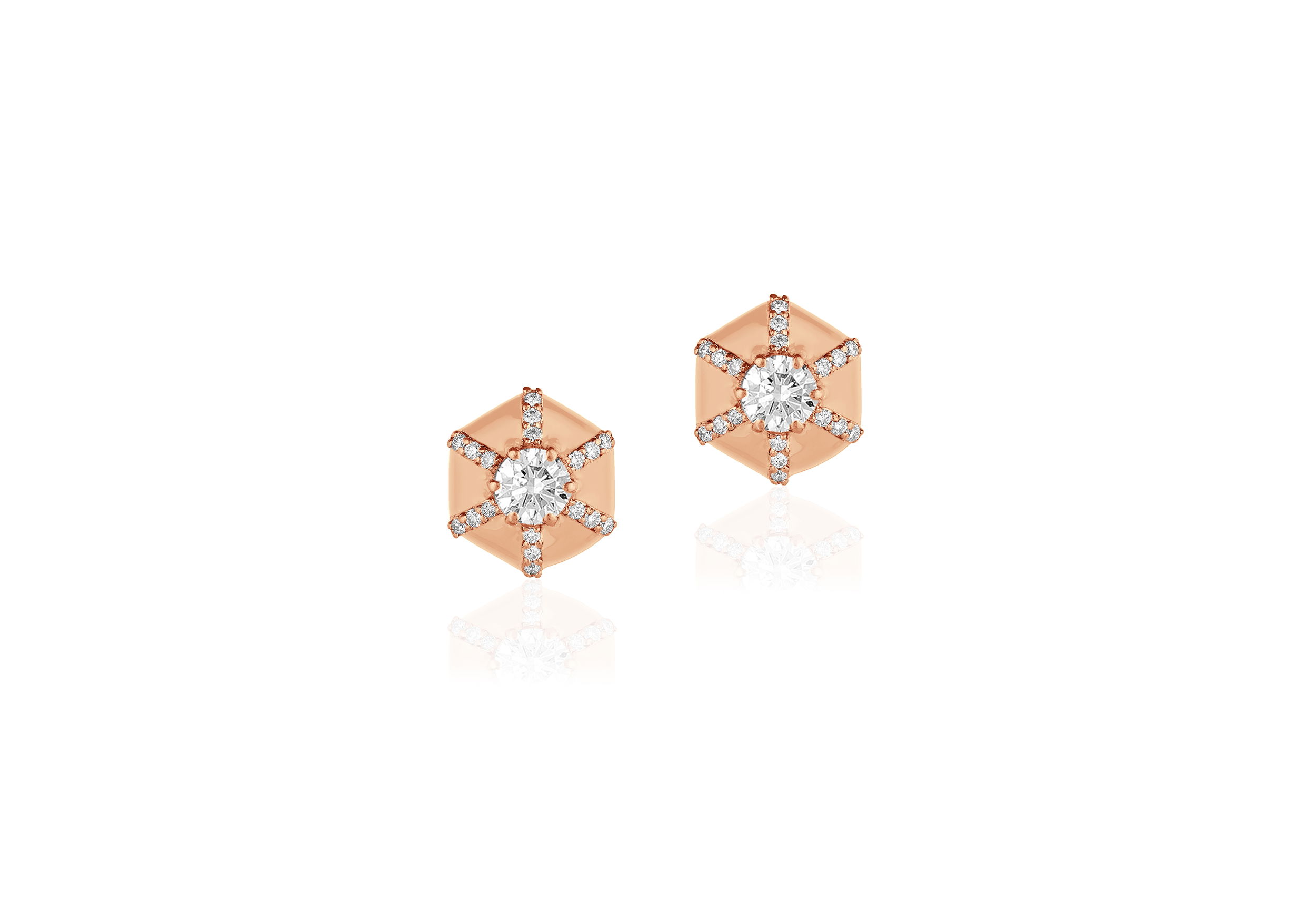 Their versatile geometry adds a regal touch to everyday style or evening glamour. Secured with a classic post-back closure, these earrings infuse timeless luxury with contemporary sophistication—perfect for those who rule their own world.-18k Yellow gold-Diamonds, 0.61ctsItem# 805-2000511 'Queen' Hexagon Diamond Stud Earrings