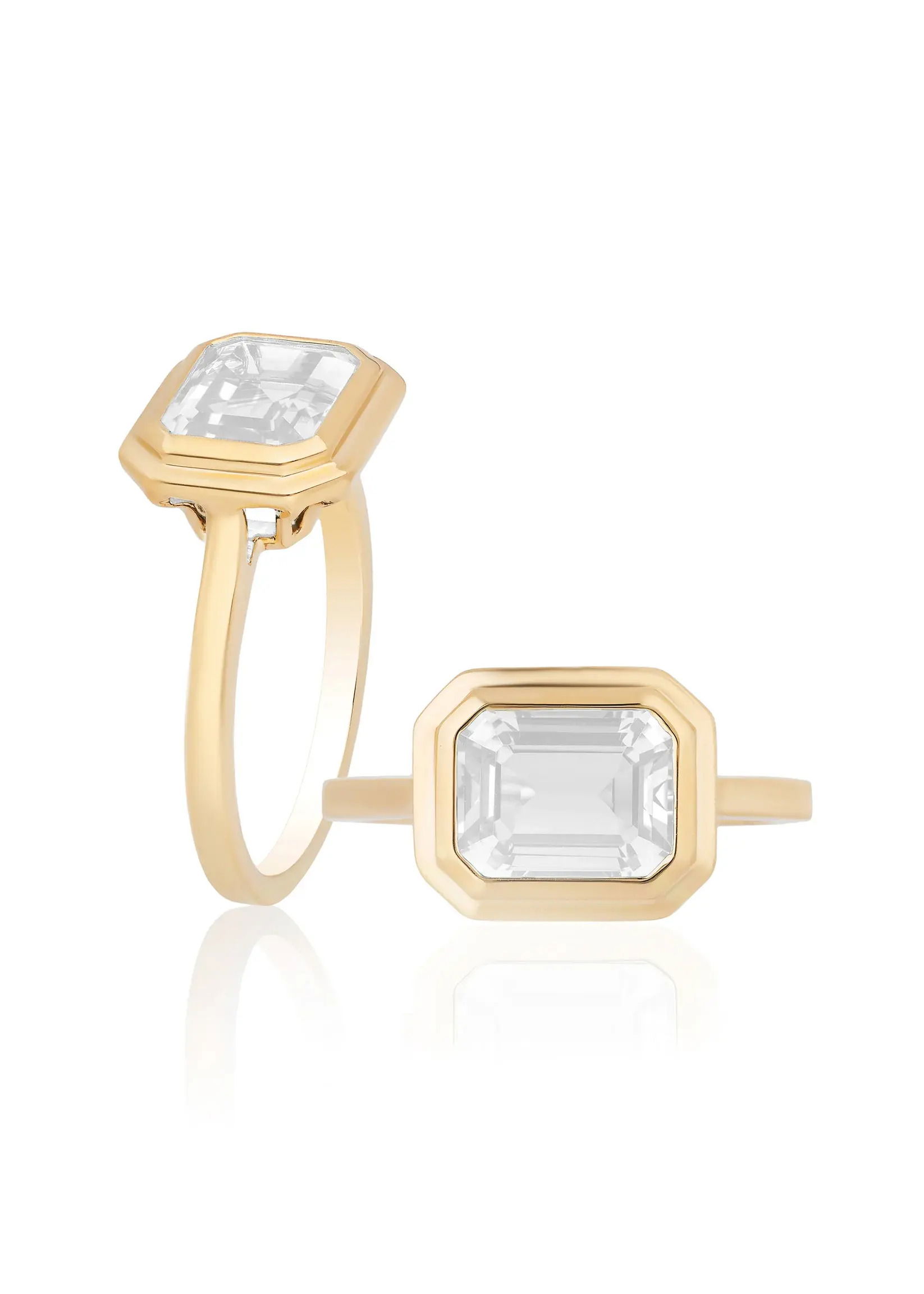 Modern in silhouette and minimal in form, the Manhattan East-West Ring sets a bold emerald-cut center within sleek,fluid lines - a refined essential with metropolitan edge.18k Yellow gold-Moon quartz, 2.05ctsItem# 200-2000158 'Manhattan' Moon Quartz Ring