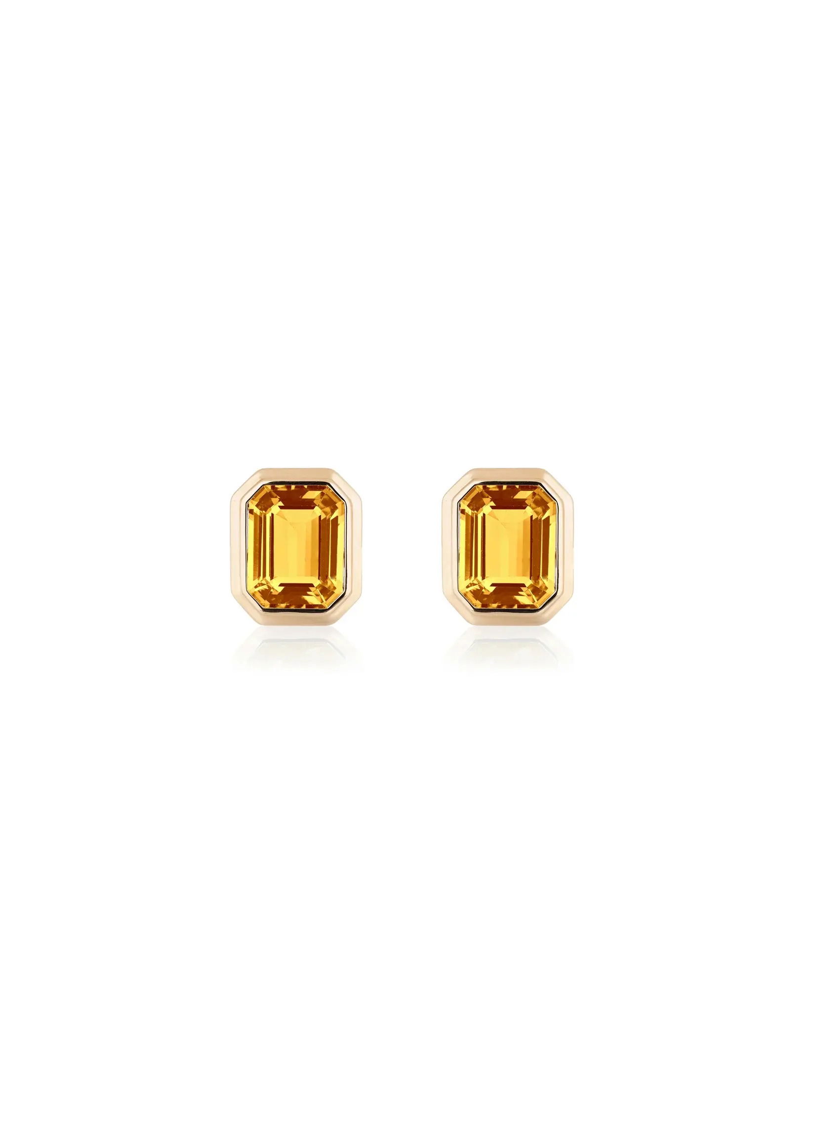 A bold essential for every collection, the Manhattan Emerald-Cut Studs strike a balance between timeless form and modern precision - effortlessly refined, endlessly versatile.18k Yellow gold-Citrine, 2.70ctsItem# 210-2000085 'Manhattan' Citrine Stud Earrings