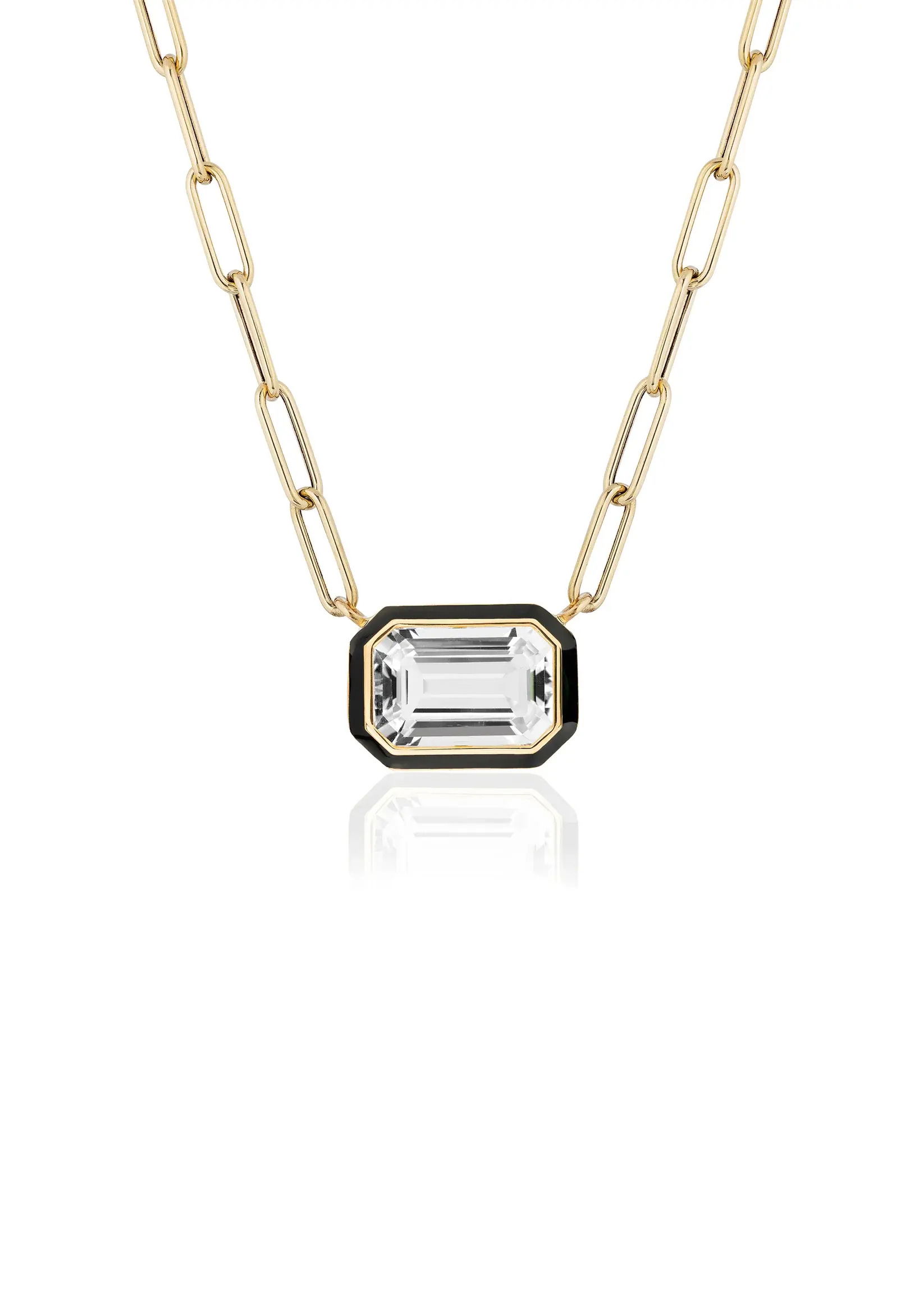 The Queen East-West Pendant reimagines elegance in a playful silhouette - an emerald-cut centerpiece framed in vividenamel, suspended in a sleek horizontal setting.18k Yellow gold-Quartz, 3.72ctsItem# 235-2000049 'Queen' Quartz and Enamel Necklace