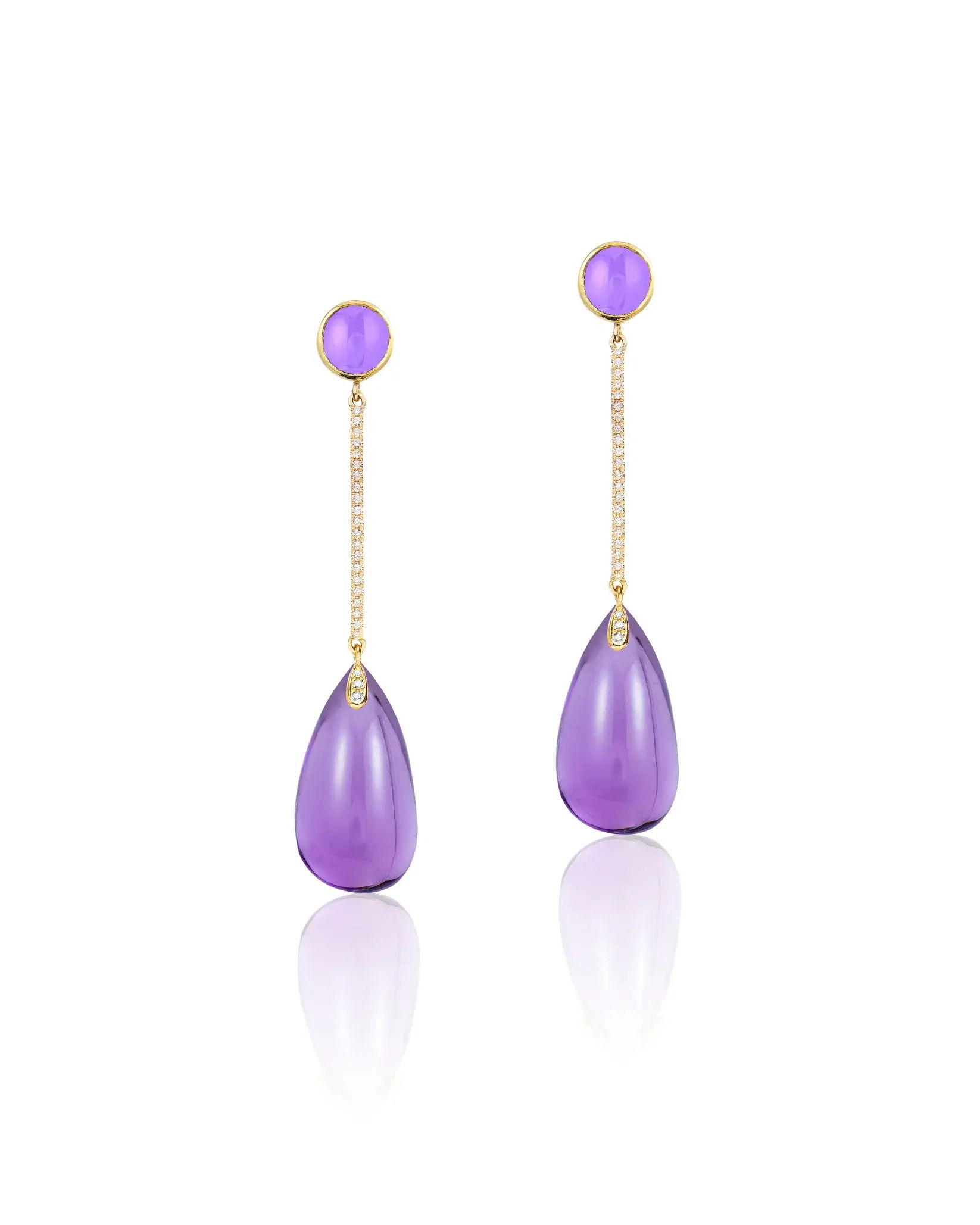 The bold teardrop silhouette is suspended from a slender, pavé-lined bar, anchored by a round cabochon stud-creating a refined, elongated line that moves with effortless fluidity.18k Yellow gold-Amethyst, 22.38cts-Diamonds, 0.27ctsItem# 210-2000092 Amethyst Cabochon Drop Earrings