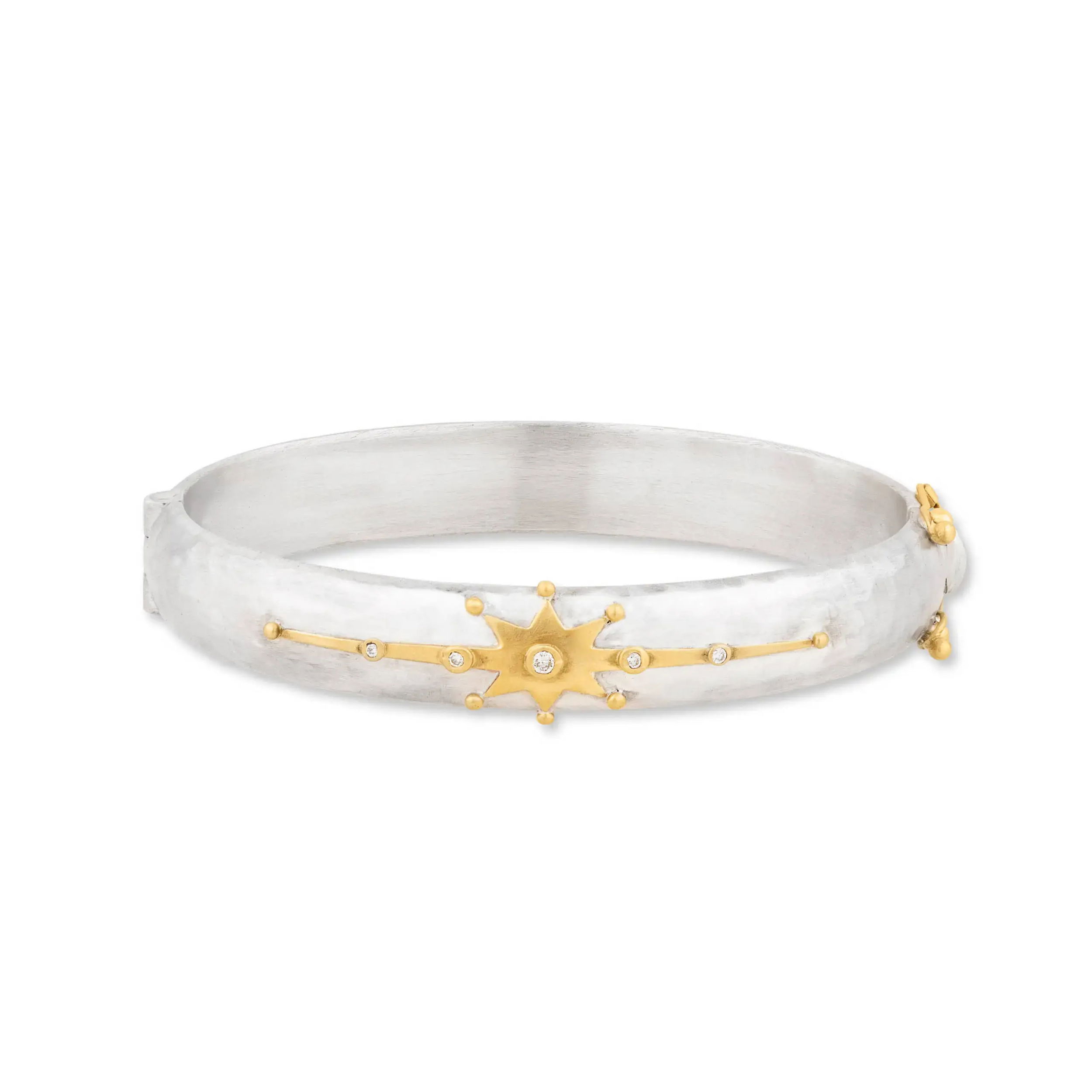 The “Stockholm Starburst” bracelet combines the warmth of 24k gold with the strength of sterling silver in a bold, elegant design. A radiant diamond accent adds subtle brilliance, while the hidden box clasp with a 14k gold figure-8 safety lock ensures a secure, seamless fit.-Sterling silver-24k Yellow gold-Diamonds 0.08cts-Size XXS-XXLItem# 808-2000311 Stockholm Starburst Bracelet