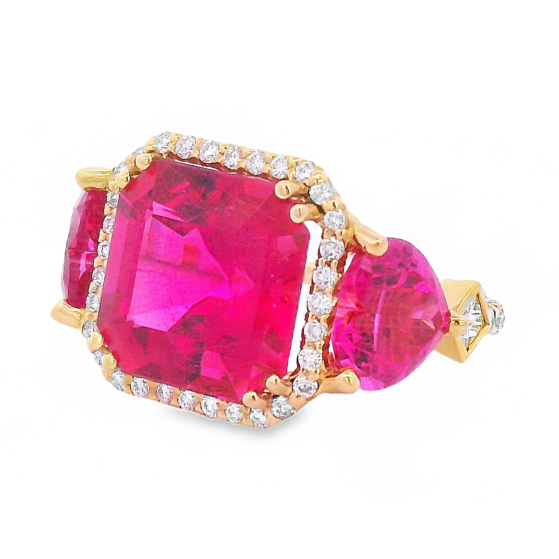 The Rubellite Trinity Ring in 18k yellow gold with sparkling diamonds is the perfect way to add a pop of color to your wardrobe! Transitional from day to night, this piece will be a beautiful addition to anyones jewelry box. Contact for sizing options.-18k Yellow gold-Diamonds, 1.70cts-Rubellite, 7.76ctsItem# 200-2000163 Rubellite Trinity Ring