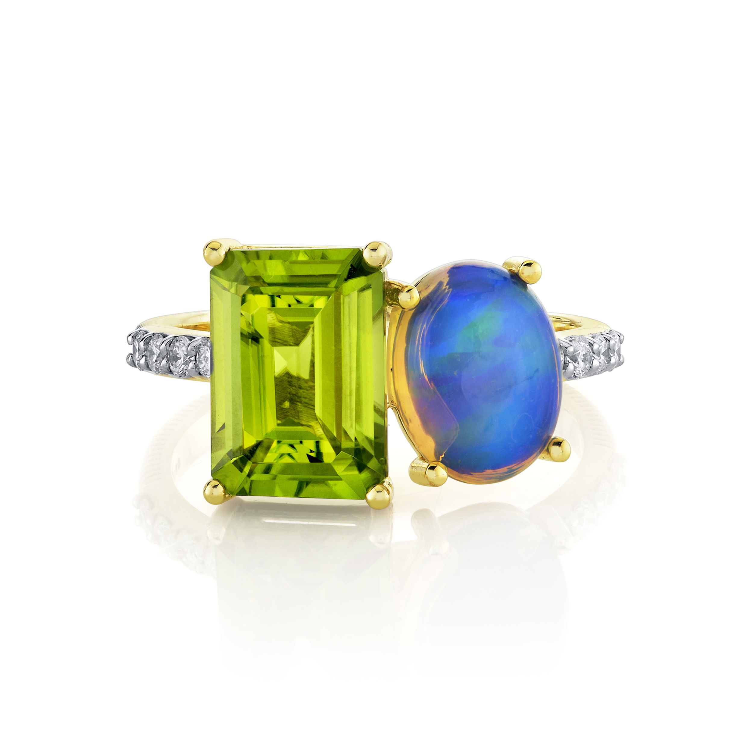 Radiating modern romance and vibrant allure, this ring is a masterpiece of fine craftsmanship. Perfect for lovers of bold design and natural gemstones, this enchanting ring is a celebration of connection and individuality, making it a meaningful adornment or unforgettable gift.18k Yellow gold-Ethiopian opal, 2.87cts-Green peridot, 1.18cts-Round diamonds, 0.19cts Item# 804-2000332 Moi Et Toi Opal and Peridot Ring