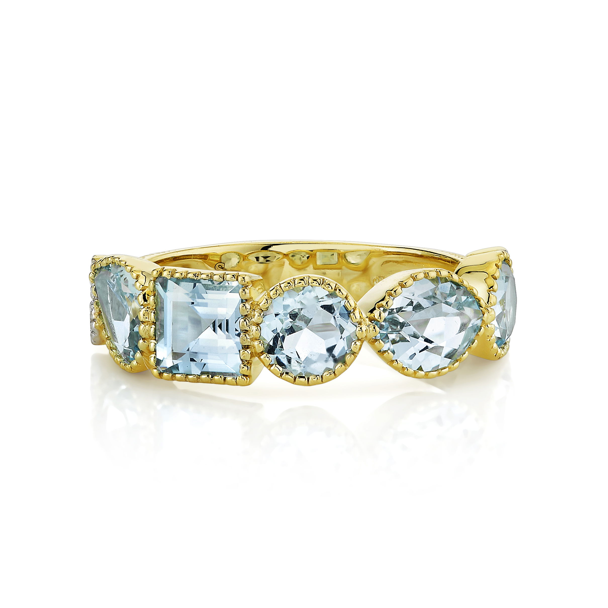 Featuring a captivating arrangement of sky blue topaz gemstones in varied cuts, each stone shimmers with freshness and clarity. Bold and modern yet timelessly elegant, this ring is the perfect statement piece for those who crave sophisticated color and luxurious craftsmanship.18k Yellow gold-Sky blue topaz, 3.55cts-Round diamonds, 0.06ctsItem# 804-2000334 Mixed Shape Topaz Ring