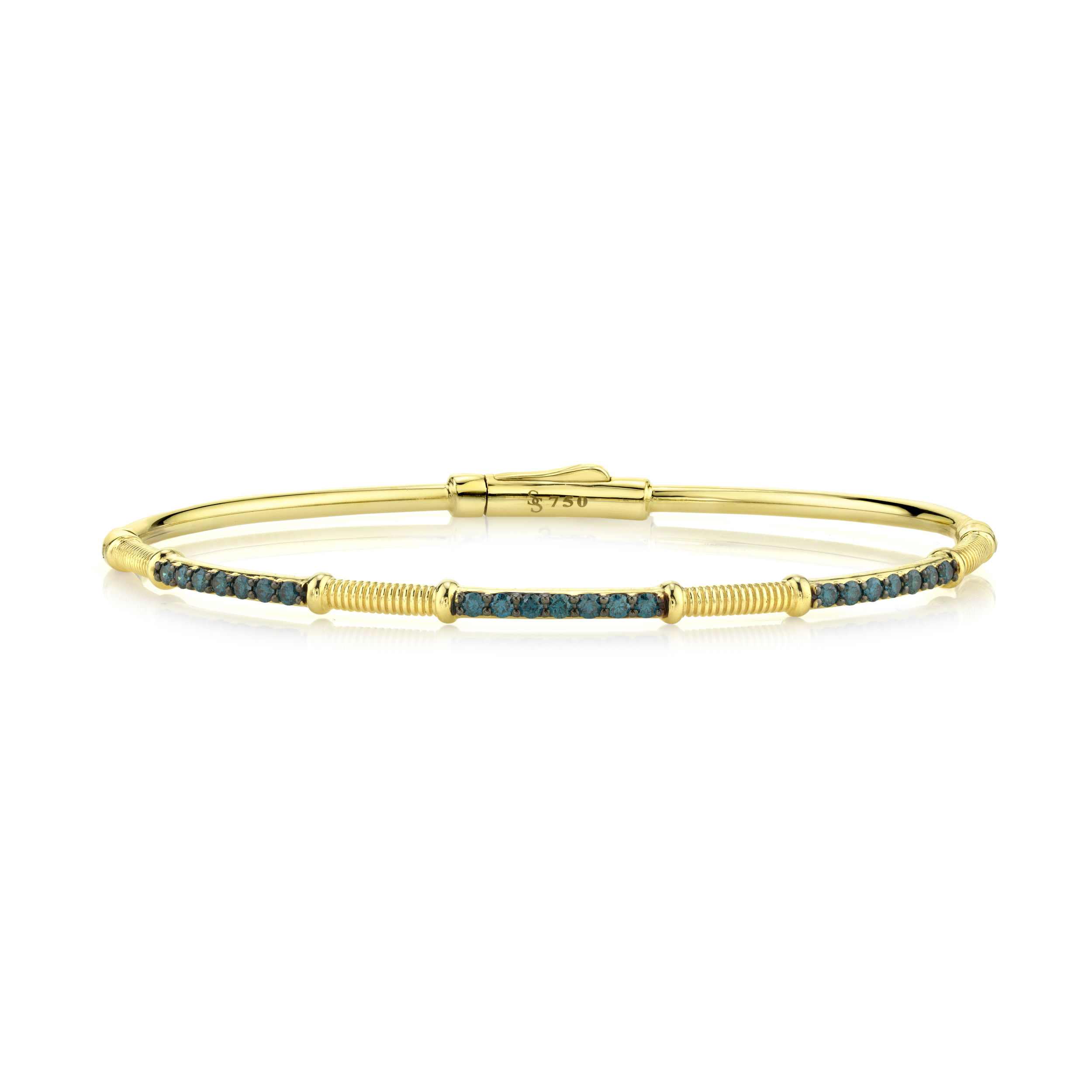 Brilliant blue diamonds are artfully set against a textured striée finish, creating a stunning interplay of color and light. This bracelet’s bold hue and intricate detailing make it the perfect statement piece for any elegant occasion.18k Yellow gold-Blue diamonds, 0.48ctsItem# 808-2000314 Blue Diamond and Strie Bracelet