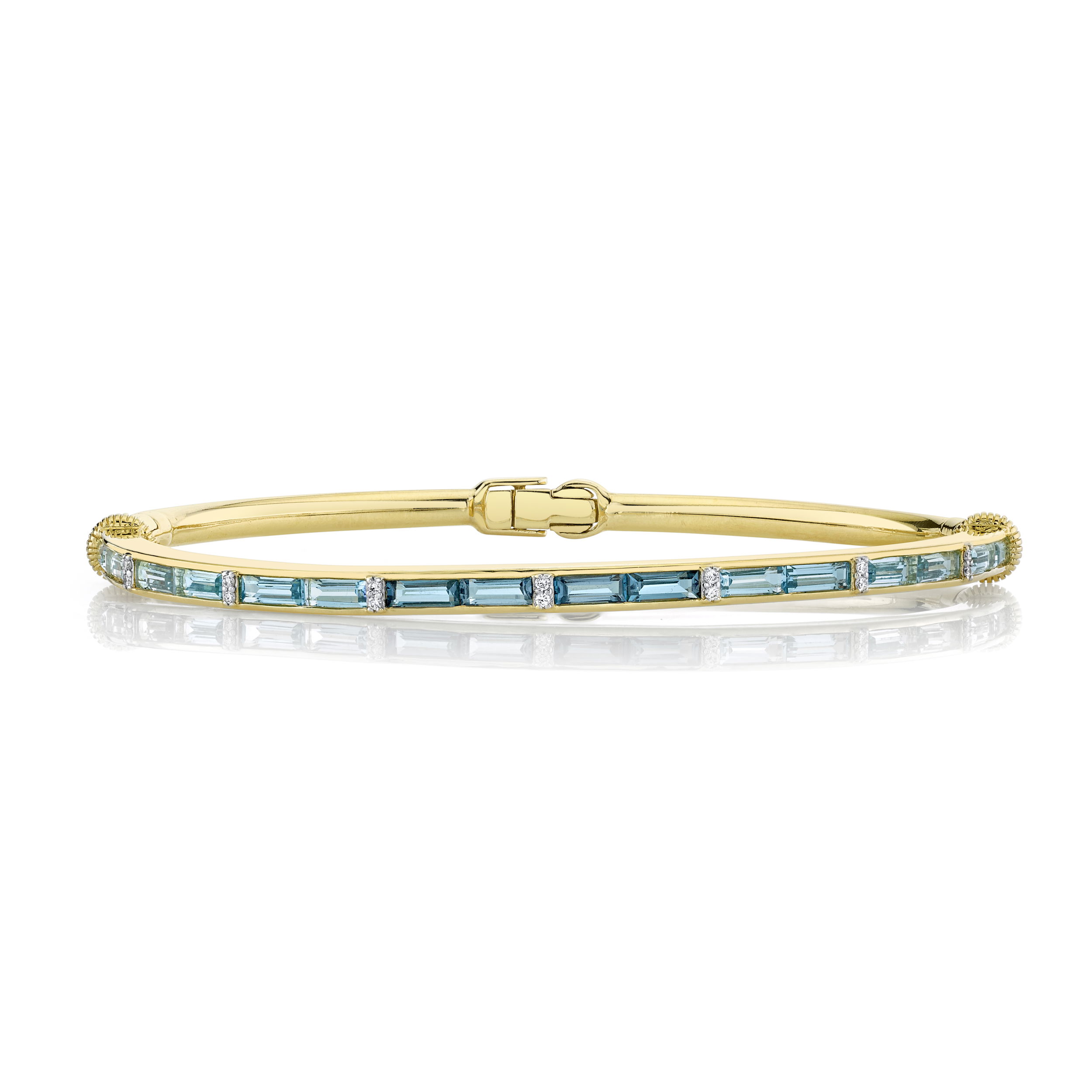 Featuring a luxurious parade of blue topaz gemstones—ranging from delicate sky blue to vivid Swiss and richly hued London blue—each stone transitions seamlessly in an ombre effect. The bracelet’s timeless design captures the essence of a clear, blue sky meeting dazzling sunlight, making it the perfect statement piece for any occasion.18k Yellow gold-London blue topaz, 0.17cts-Swiss blue topaz, 0.19cts-Sky blue topaz, 0.20cts-Round diamonds, 0.07ctsItem# 808-2000316 Ombre Blue Topaz and Diamond Bracelet