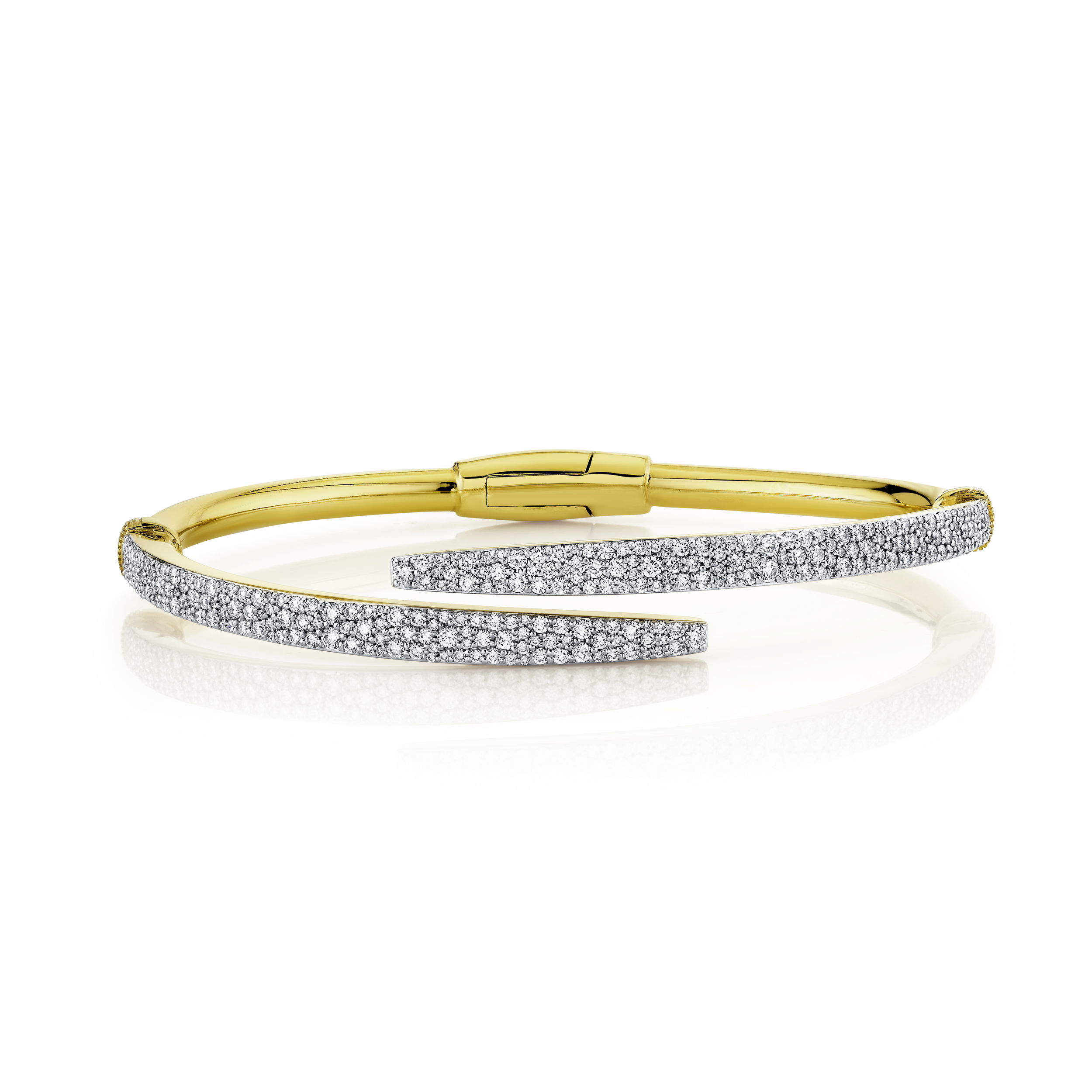 The unique bypass design forms a graceful embrace around the wrist, adorned with shimmering pave-set diamonds that catch the light from every angle. Perfect for both everyday sophistication and special occasions, this bracelet blends timeless style with modern allure—a truly dazzling addition to any jewelry collection.18k Yellow gold-Round diamonds, 2.04ctsItem# 808-2000317 Pave Diamond Bypass Bracelet