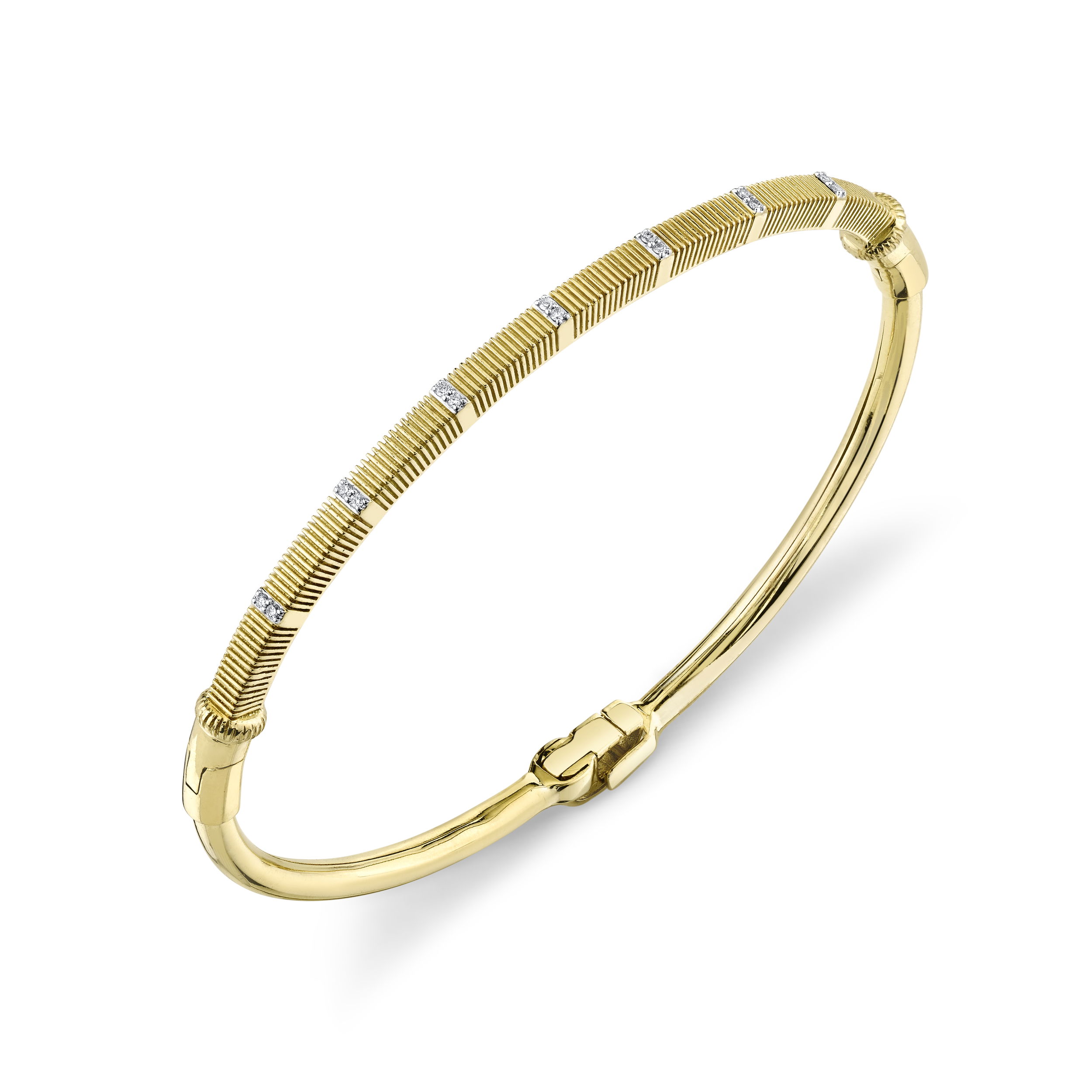 This bracelet’s refined design embodies sophistication, making it a perfect statement piece for any occasion. Secure it on your wrist to elevate your style with the everlasting brilliance of diamonds and the warmth of pure gold.18k Yellow gold-Round diamonds, 0.07ctsItem# 808-2000319 Diamond and Strie Bracelet