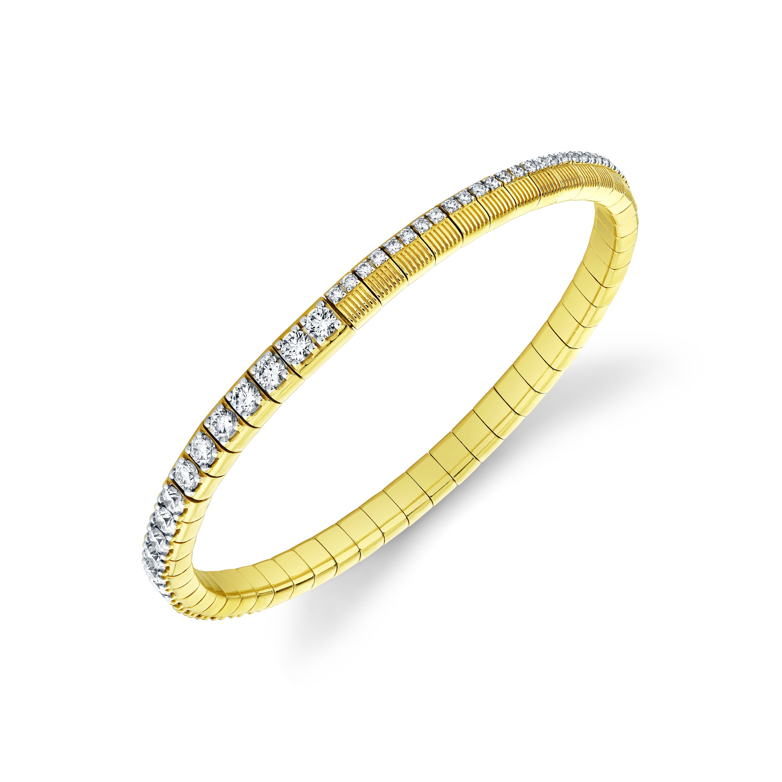 This elegant bracelet showcases a refined strié texture, enhanced by a row of sparkling diamonds for a touch of timeless glamour. Featuring a comfortable stretch design, it effortlessly glides onto your wrist, creating a luxurious statement piece perfect for everyday wear or special occasions. 18k Yellow gold-Round diamonds, 3.55ctsItem# 808-2000322 Strie and Diamond Stretch Bracelet