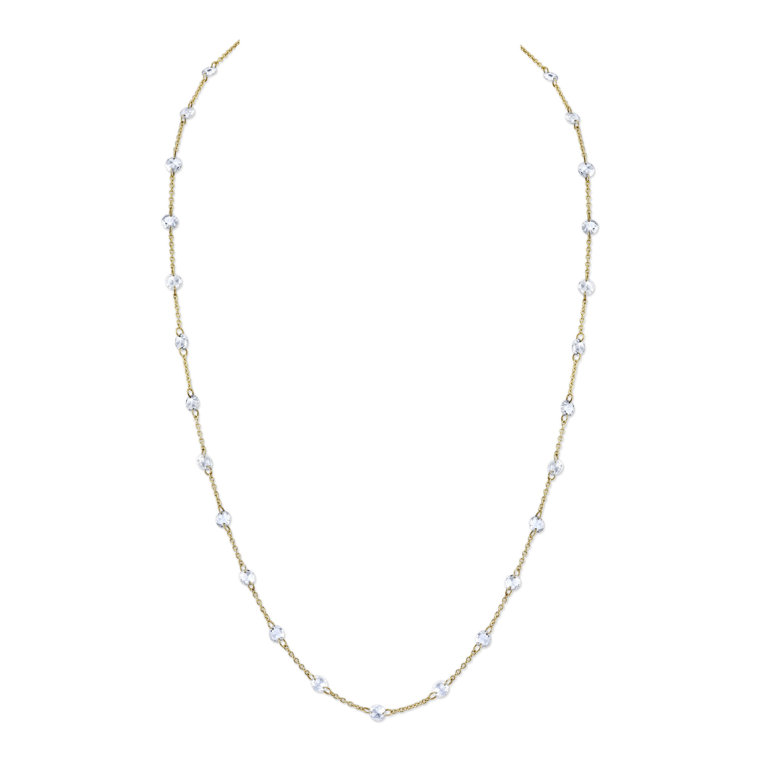 Crafted in exquisite 18k yellow gold, this necklace features delicately set rose cut diamonds that shimmer with every movement, capturing light from every angle. The refined chain offers a touch of sophistication, seamlessly blending classic beauty with modern luxury. 18k Yellow gold-Rose cut diamonds, 2.70cts-Chain length, 16"-18" on adjustable chainItem# 807-2000398 Rose Cut Diamond Chain Necklace