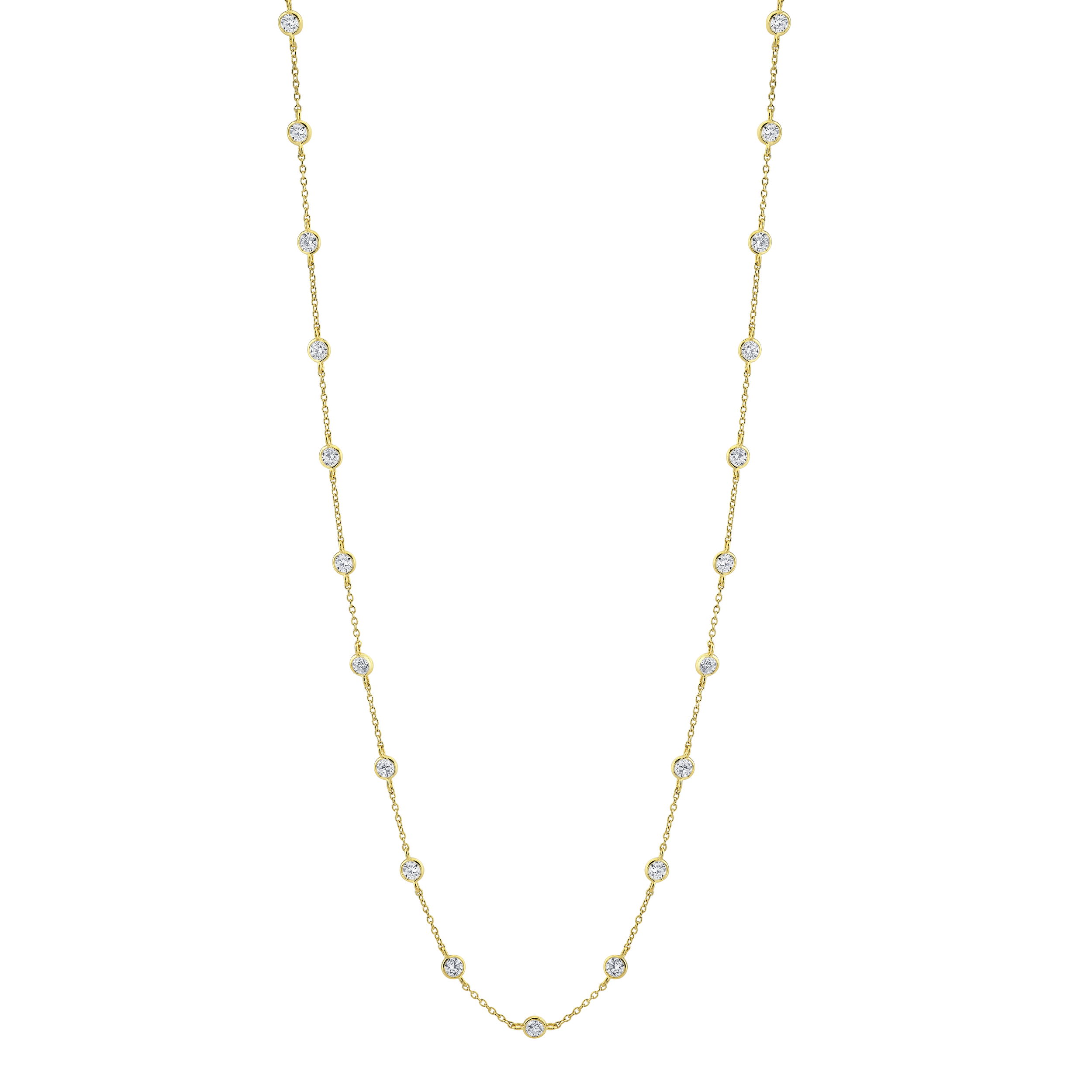 Delicately spaced along a fine chain, sparkling round brilliant-cut diamonds are individually set in sleek, modern bezels that capture and reflect the light beautifully. This timeless necklace offers a graceful shimmer, perfect for layering or wearing solo. Secure, chic, and versatile—it’s a classic piece designed to radiate sophistication with any look.18k Yellow gold-Round diamonds, 2.31ctsItem# 807-2000400 Bezel Set Diamonds By The Yard Necklace