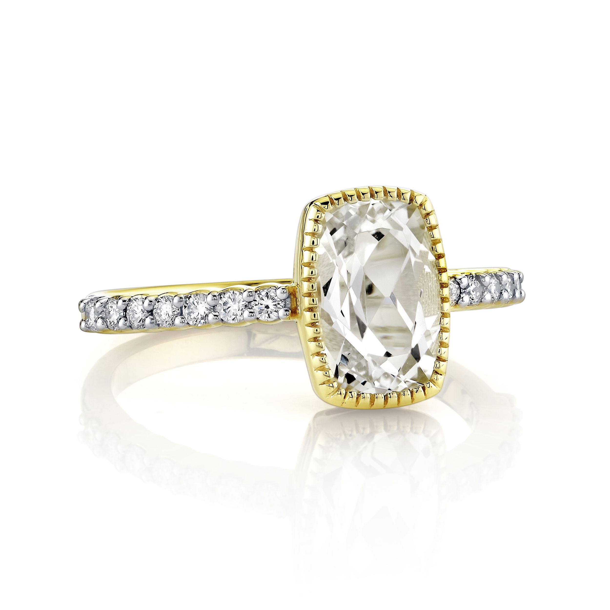 At its heart shines a captivating white topaz, its clarity and brilliance beautifully complemented by the warm glow of the gold band. Perfect for special occasions or as a cherished everyday piece, this ring blends timeless design with modern allure, making it a stunning addition to any jewelry collection.18k Yellow gold-White topaz, 2.28cts-Diamonds, 0.21ctsItem# 804-2000343 White Topaz and Diamond Ring