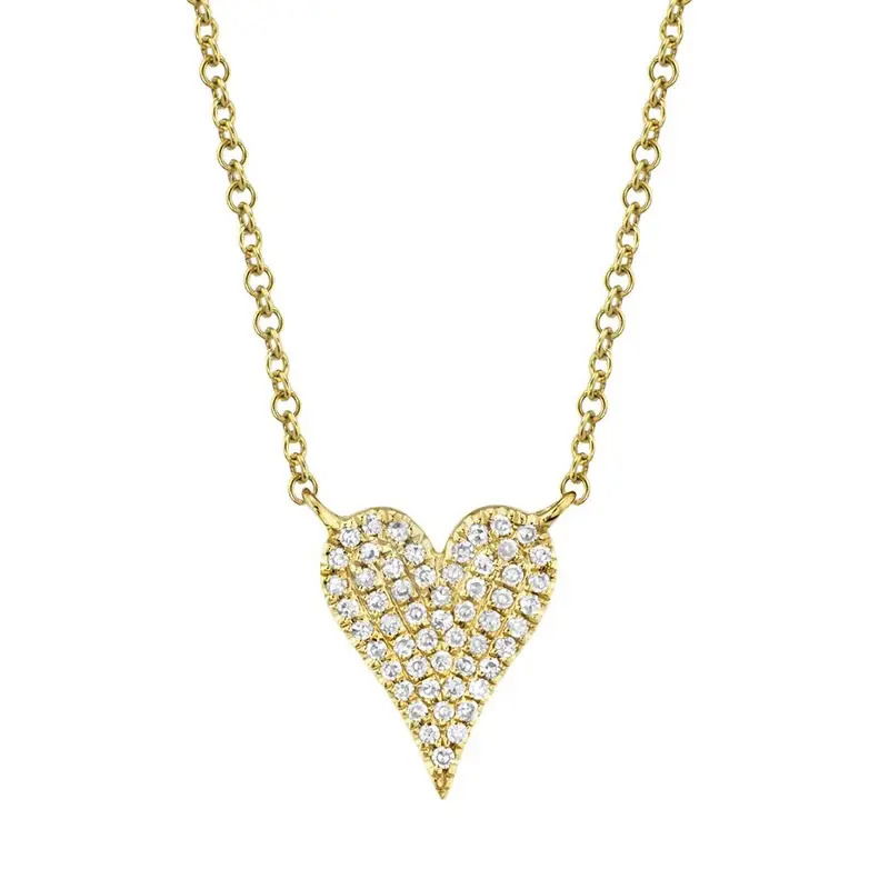 A great piece alone or to layer, this necklace is perfect for both everyday wear and special occasions. Shy Creation diamonds are natural and hand-selected. All stones are unique and hand set. As a result, you can expect slight variations in the shade, hue, tint of the color stones and stone count. 14k Yellow gold-Round diamonds, 0.11cts-Chain length, 15"-18"Item# 807-2000405 Diamond Pave Heart Necklace