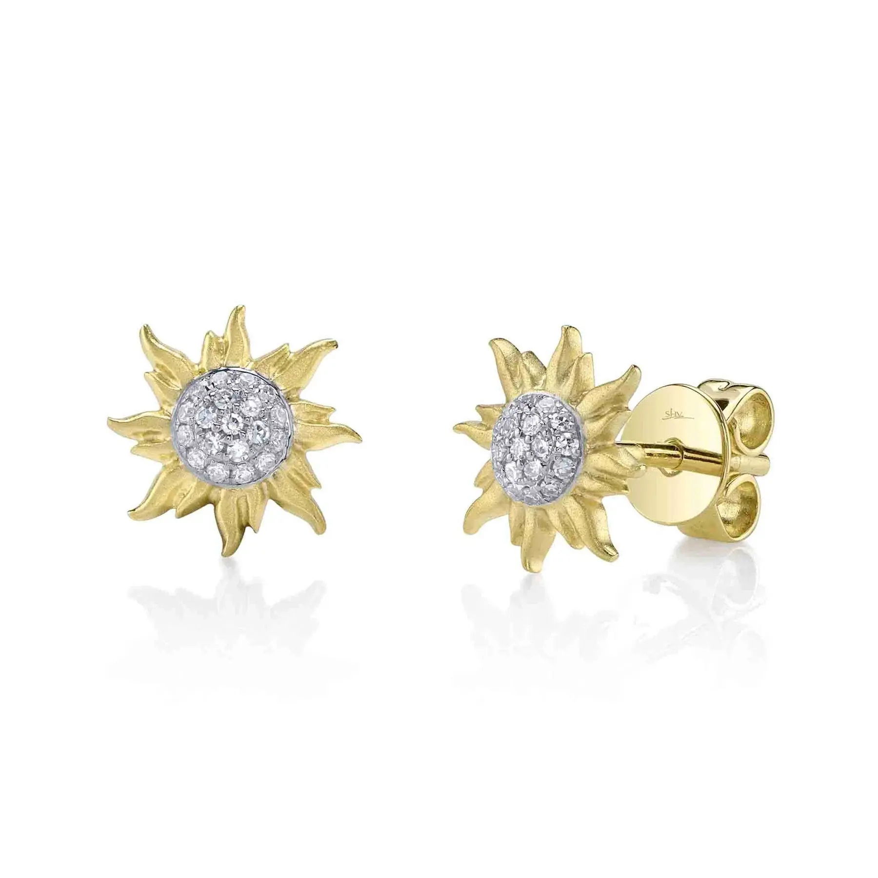 Turn heads with this standout piece that adds a bold statement to any look, day or night. All Shy Creation diamonds are natural and hand-selected. All stones are unique and hand set. As a result, you can expect slight variations in the shade, hue, tint of the color stones and stone count.14k Yellow gold-Round diamonds, 0.08cts-Dimensions, 0.35"L / 0.35"WItem# 805-2000553 Diamond Pave Matte Sun Stud Earrings