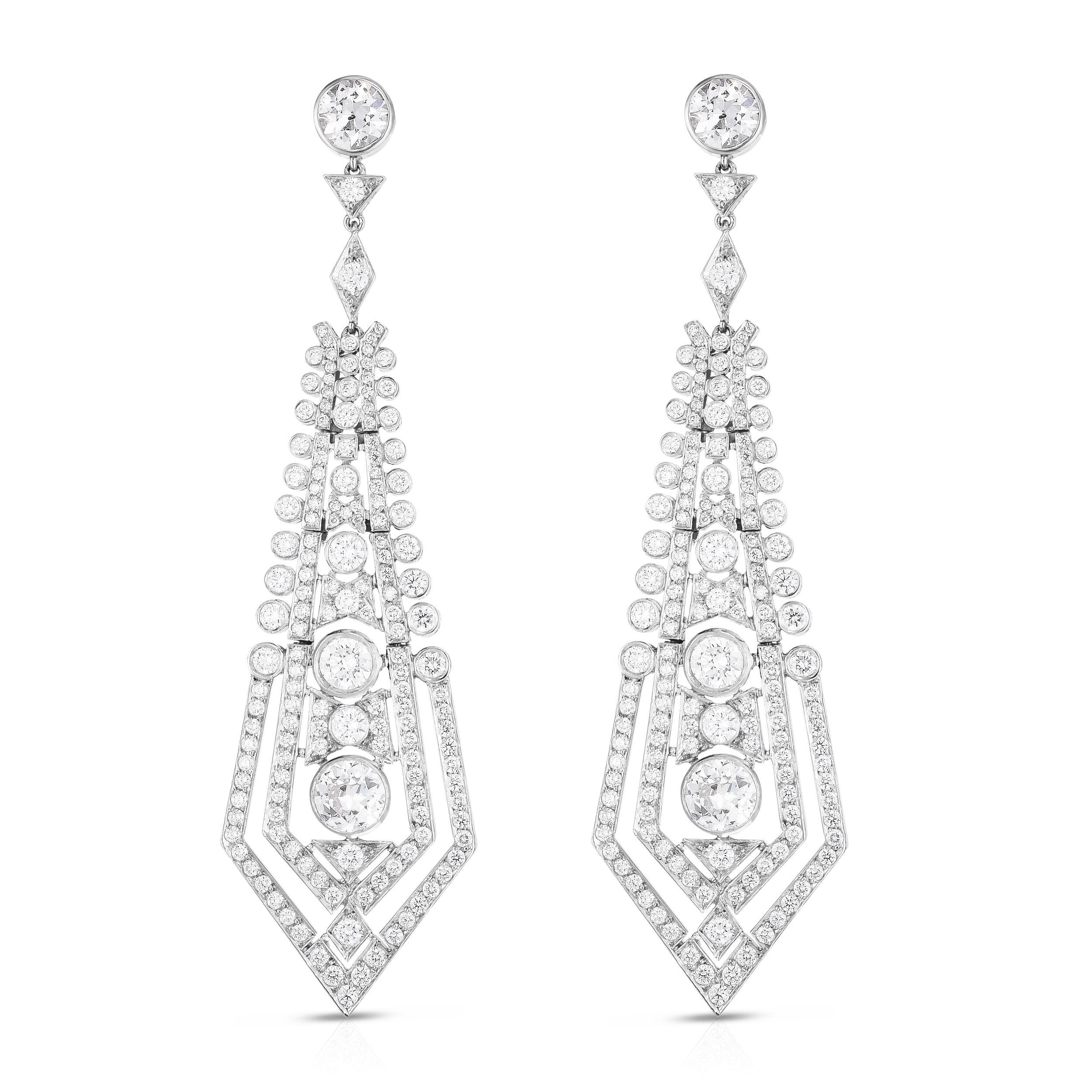Dazzling art deco drop earrings featuring diamonds set in platinum. Perfect for a special occasion, these earrings sparkle from every angle. Cicada atelier is located in the heart of the New York City jewelry district on 47th street, where each unique piece is meticulously handcrafted.-Platinum-Diamonds, 4.5cts-Drop style earring-Item# 805-2000559 Deco Dream Earrings