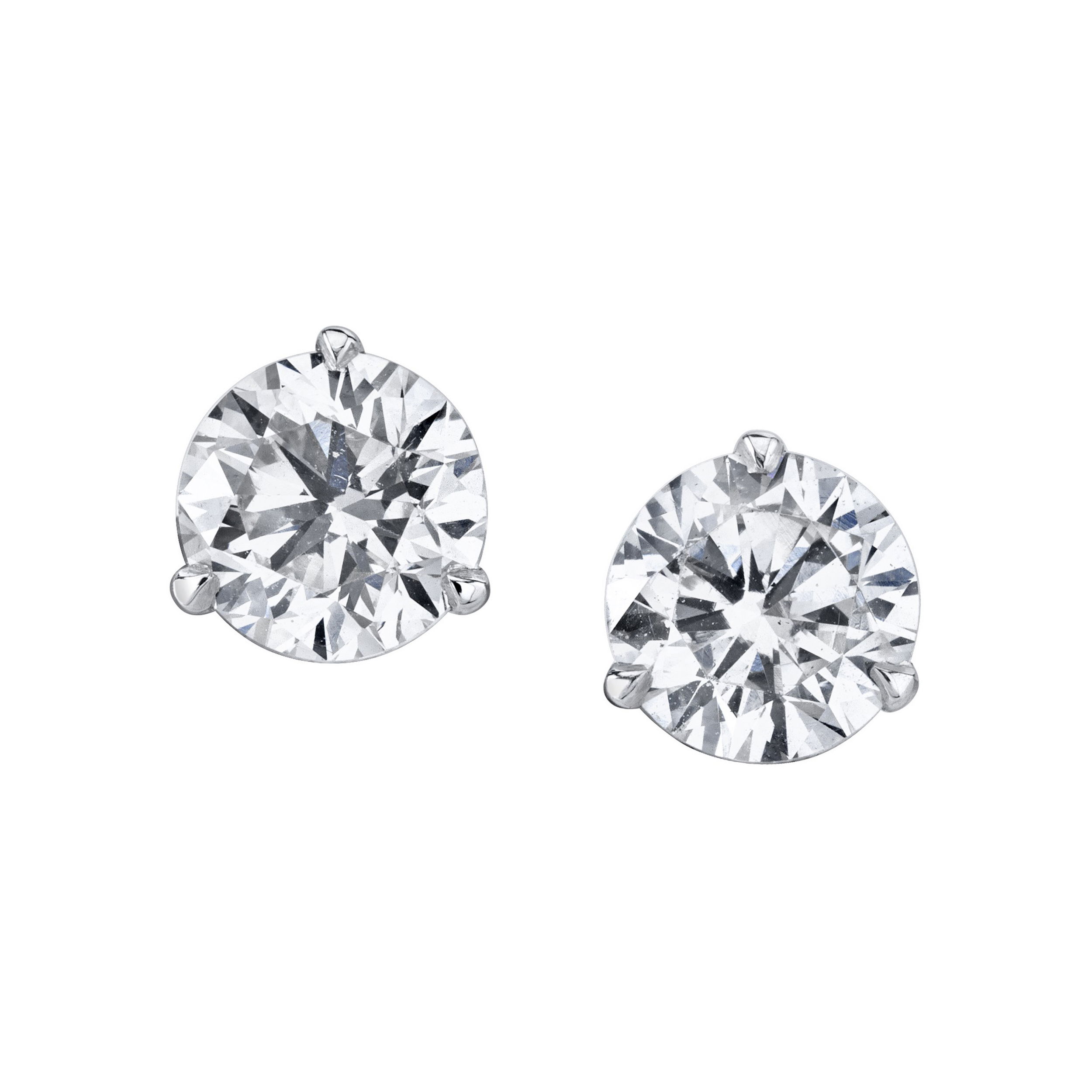 Radiate timeless elegance with our Round Diamond Stud Earrings. Whether worn solo or paired with other pieces, this classic accessory adds a touch of sophistication and sparkle to any ensemble. -18k White gold-Round diamonds, 8.01ctsItem# 150-2000126 Round Diamond Stud Earrings