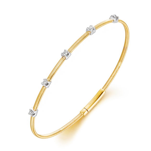 Level up your look with this timeless Diamond Flex Bangle in 14k white and yellow gold. This piece makes the perfect gift for any occasion, and a beautiful treat for yourself, too!-14k White and yellow gold-Diamonds, 0.28ctsItem# 808-2000331 Diamond Flex Bangle