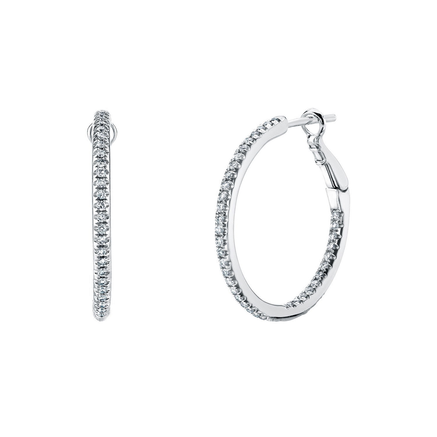 Perfectly balancing classic sophistication and modern allure, these earrings are an essential addition to any fine jewelry collection, ideal for both everyday wear and special occasions. -18k White gold-Round diamonds, 0.29ctsItem# 150-2000130 Diamond Hoop Earrings