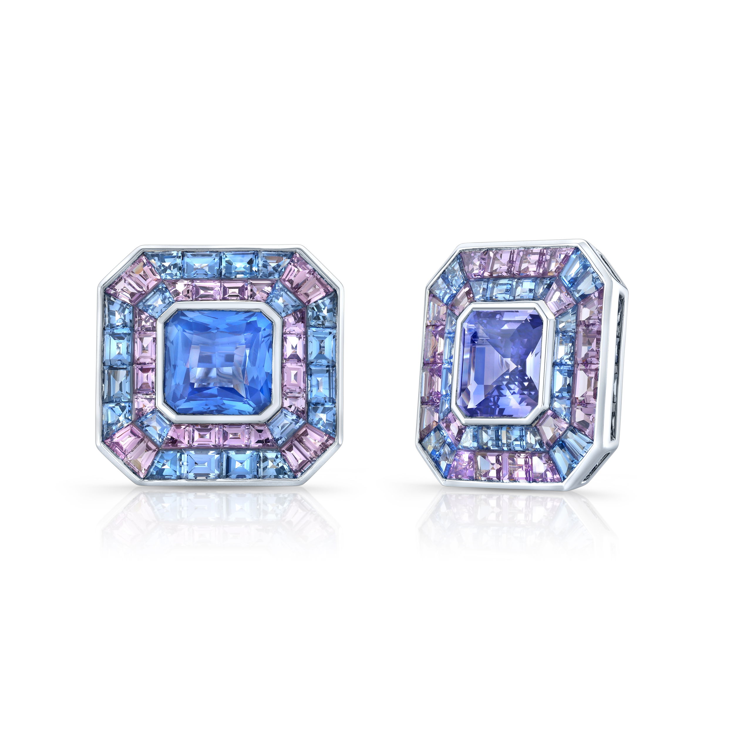 From Robert Procop’s Masterpiece Collection, these stunning platinum earrings showcase rare violet blue and blue violet octagon-shaped sapphires. Surrounded by a delicate halo of lilac and blue sapphires, they capture a unique blend of color and elegance, perfect for the discerning collector.-Platinum -Violet blue sapphires (center stones), 5.21cts-Violet and blue sapphires, 6.04ctsItem# 210-2000097 Blue and Violet Sapphire Masterpiece Earrings