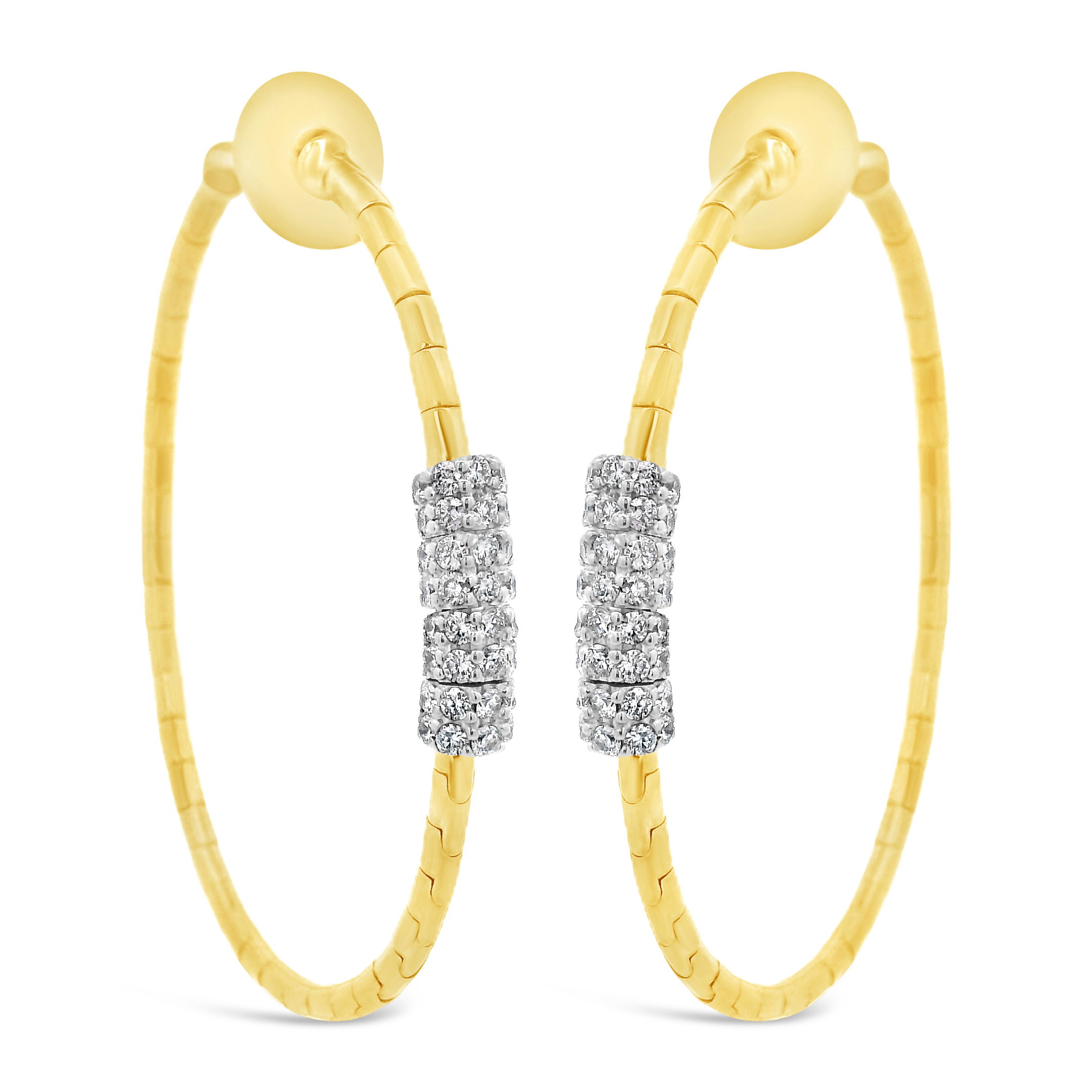 The warm glow of 18k yellow gold beautifully complements the sparkle of the diamonds in these substantial hoop earrings. The brilliant detail in these earrings create a luxurious and eye-catching statement.-18k Yellow gold-Diamonds, 0.91ctsItem# 805-2000583 Large Hoop Earrings