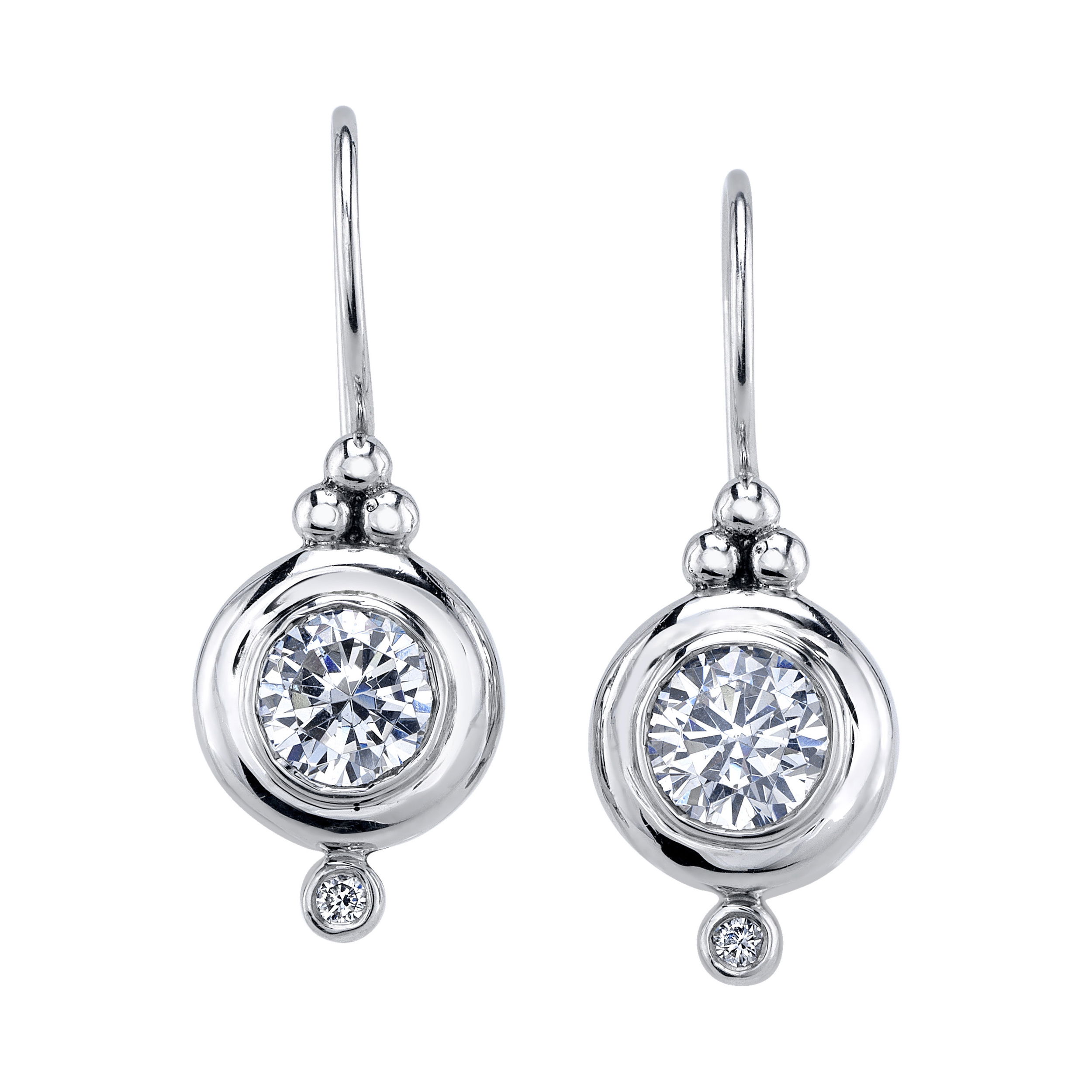 Crafted from luxurious 18k white gold, these drop earrings showcase a captivating sparkle of expertly cut diamonds. The delicate design creates a sophisticated and refined look, ideal for both special occasions and everyday wear.-18k White gold-Lab grown diamonds, 1.50cts-Natural diamonds, 0.04ctsItem# ND-EAR-00040 Diamond Drop Earrings