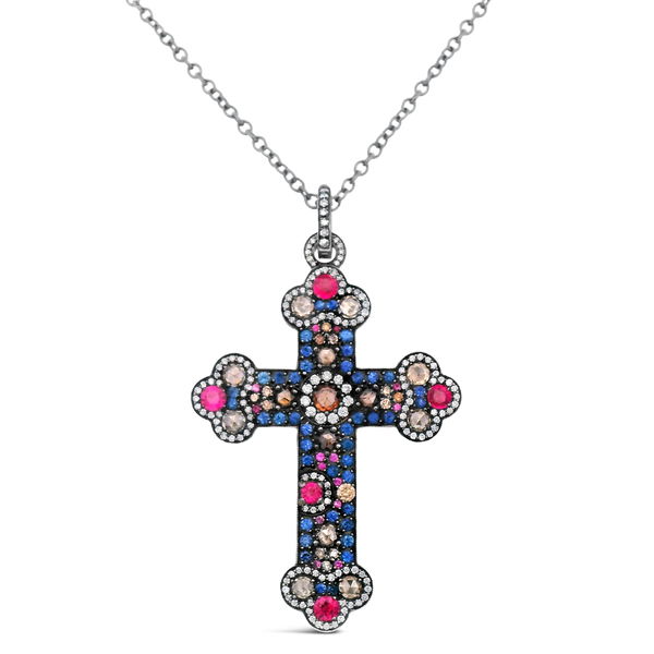 Closeup photo of Sapphire and Cognac Diamond Cross