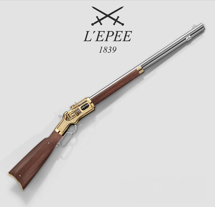 The Golden Boy, a collaboration between The Unnamed Society and L’Epée 1839, reimagines the iconic Winchester repeating rifle, embodying the spirit of adventure and craftsmanship that defined the American West. This meticulously engineered clockwork masterpiece, inspired by the 1866 ‘Yellow Boy’ rifle - a symbol of legendary battles - seamlessly blends functionality with artistry, offering a tangible connection to a pivotal moment in history. Holding the Golden Boy is not just possessing a timepiece; it’s experiencing a legacy of innovation and the enduring allure of the American frontier.-11 jewels-Mechanical display-Polishing, Micro-blasting and Satin-finishing entirely by hand-109.3cm long x 5.7cm wide x 20cm high, Weight: 5.4kg-Clock operating duration: 8 days. Frequency : 18,000vph / 2.5HzItem# time-00127 Winchester Gold Rifle Timepiece with Tobacco Rosewood