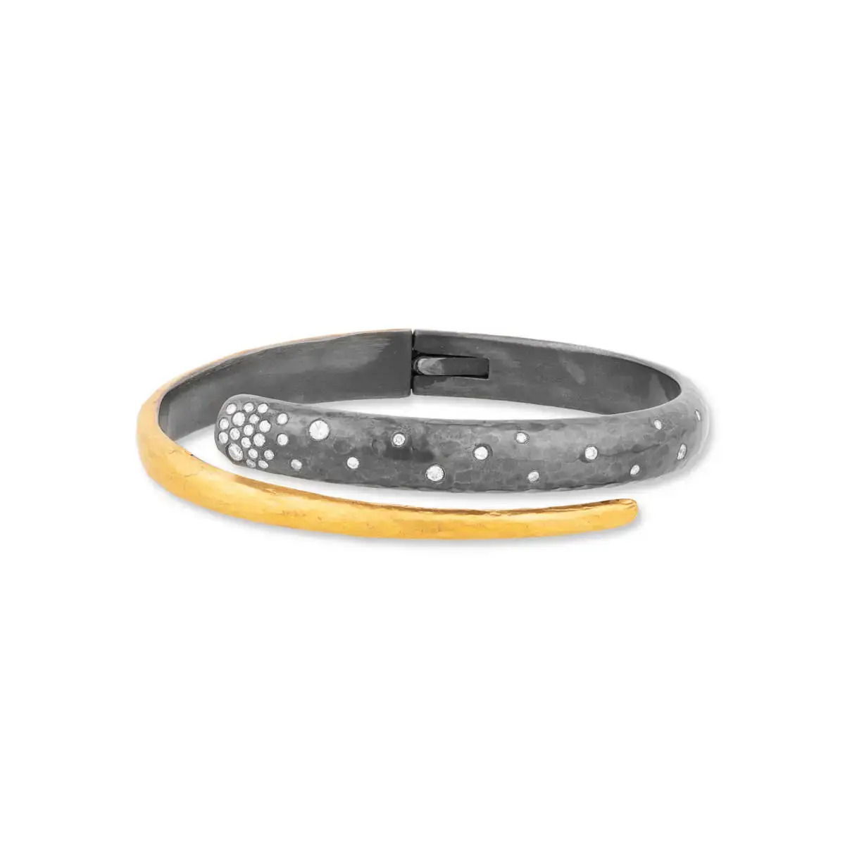 Bold and refined, the Midnight Wrap bracelet pairs the warmth of 24k fused gold with the dark elegance of oxidized sterling silver. Accented with sparkling diamonds, this one-of-a-kind piece wraps the wrist in contrast and character. -Oxidized silver-24k Yellow gold fusion-Diamonds, 0.37ctsItem# 808-2000357 Midnight Wrap Bracelet