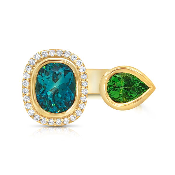 Closeup photo of POW Blue Zircon X Tsavorite Ring