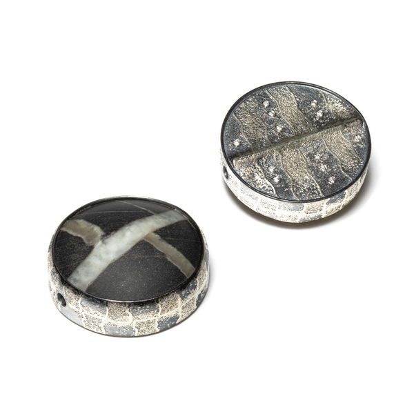 Closeup photo of Disc Clasp