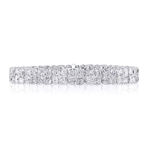 Closeup photo of Alternating Oval and Round Diamond Shared Prong Bracelet