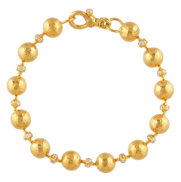 Closeup photo of 24k Gold Hammered Ball Diamond Bracelet