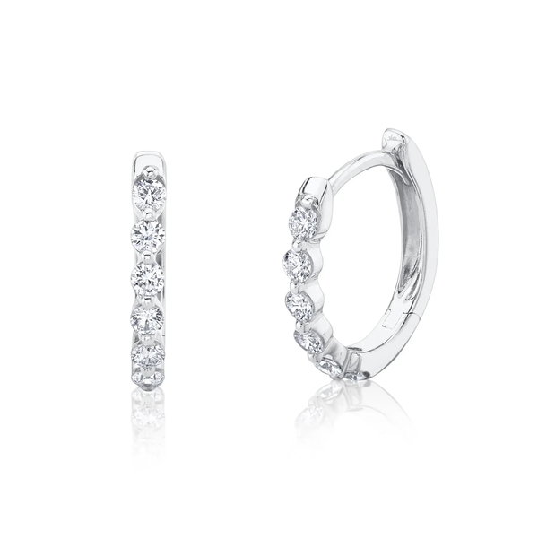 Closeup photo of Diamond Oval Huggie Earrings