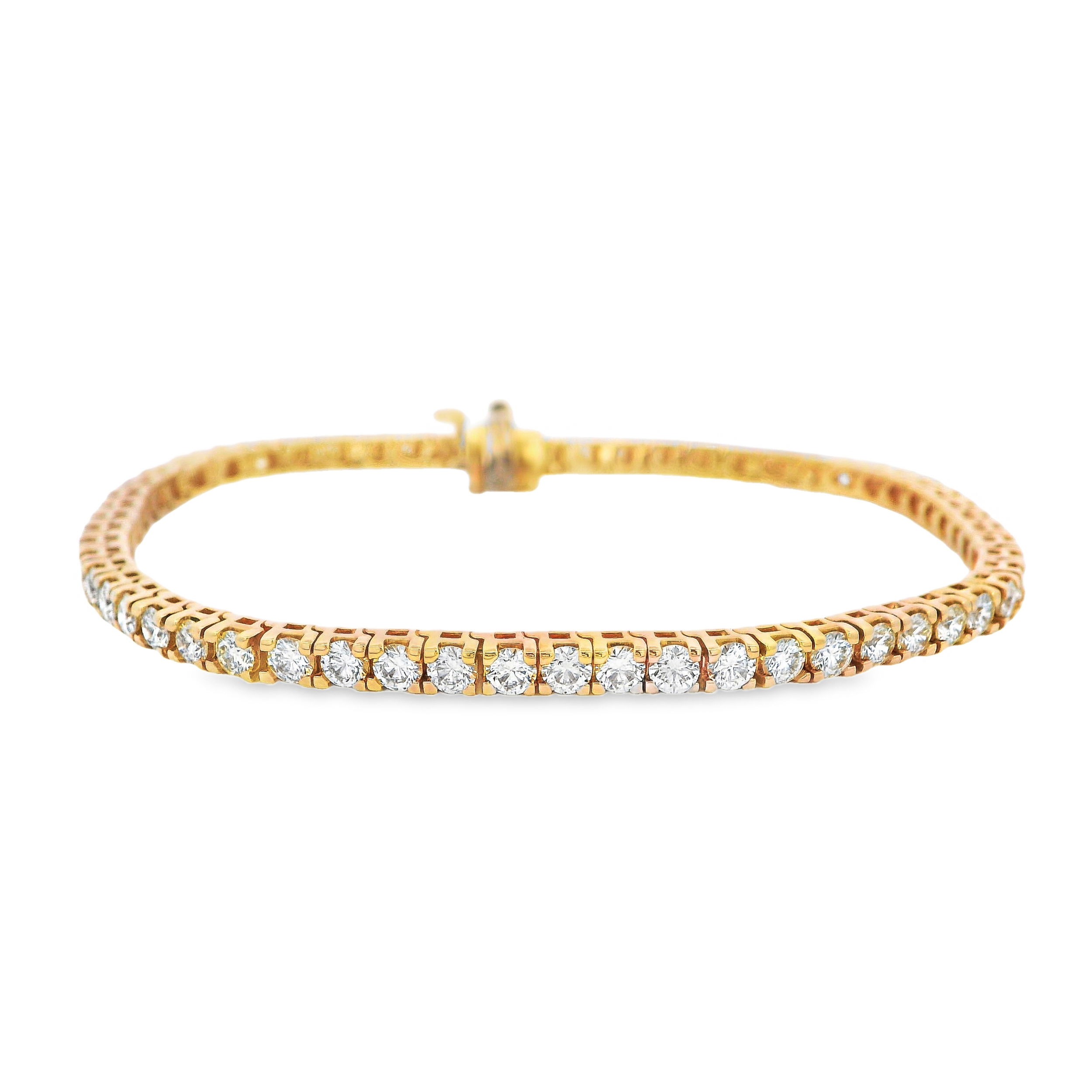 Crafted in 14K yellow gold, this bracelet features 4.33 carats of round diamonds. A warm, elegant touch of everyday luxury.-14k Yellow gold-Diamond, 4.33cts-Length 7"Item# 001-170-01145 Diamond Line Bracelet
