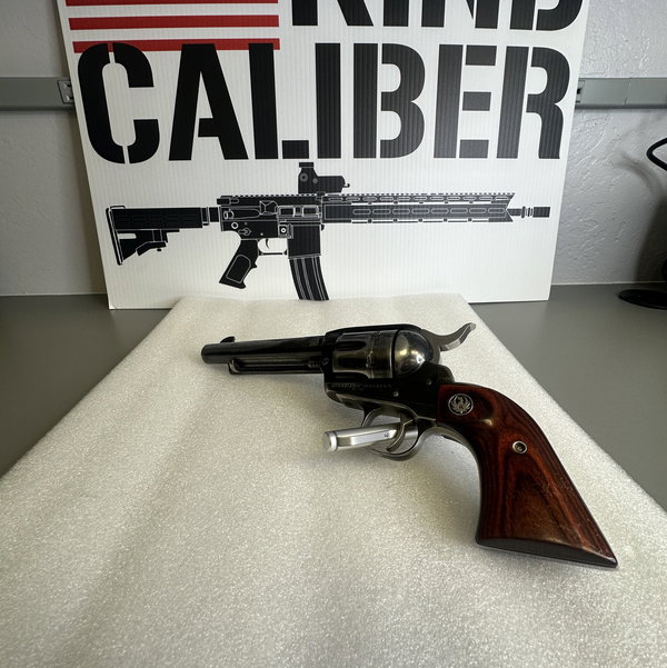 Closeup photo of Ruger New Vaquero .45 Colt Single Action Revolver 5.5" Barrel Wood Grips – w/ Leather Holster