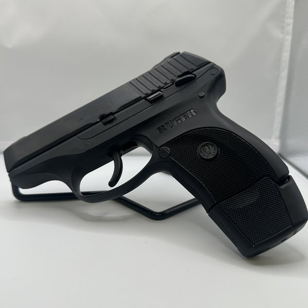 Closeup photo of Ruger LC9 9mm – Original Box – Extended Mag – Holster