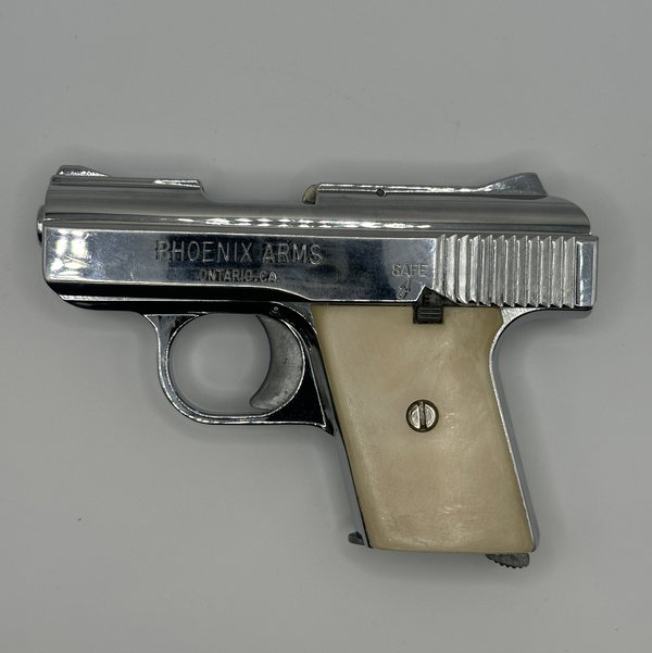 Closeup photo of Phoenix Arms Raven .25 ACP Pocket Pistol – Chrome Finish – Made in USA – w/ Holster