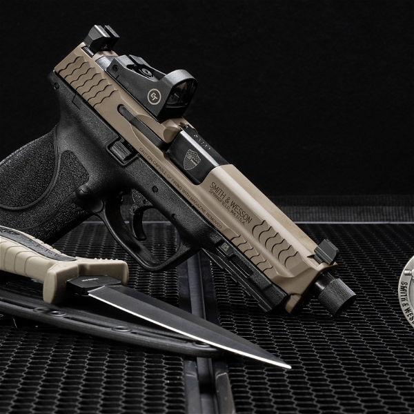 Closeup photo of Smith & Wesson M&P9 M2.0 9mm Semi-Automatic Pistol Threaded Barrel NRA Edition w/Knife
