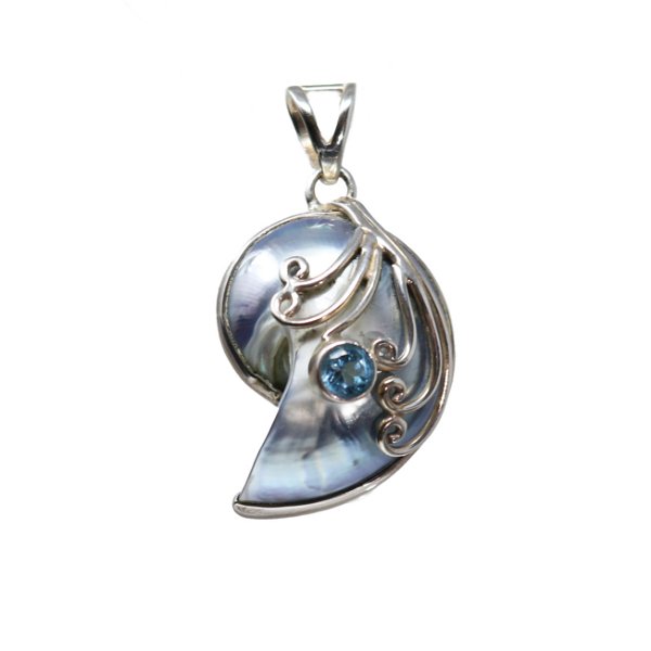 Closeup photo of Shell Pendant With Faceted Blue Topaz Gemstone