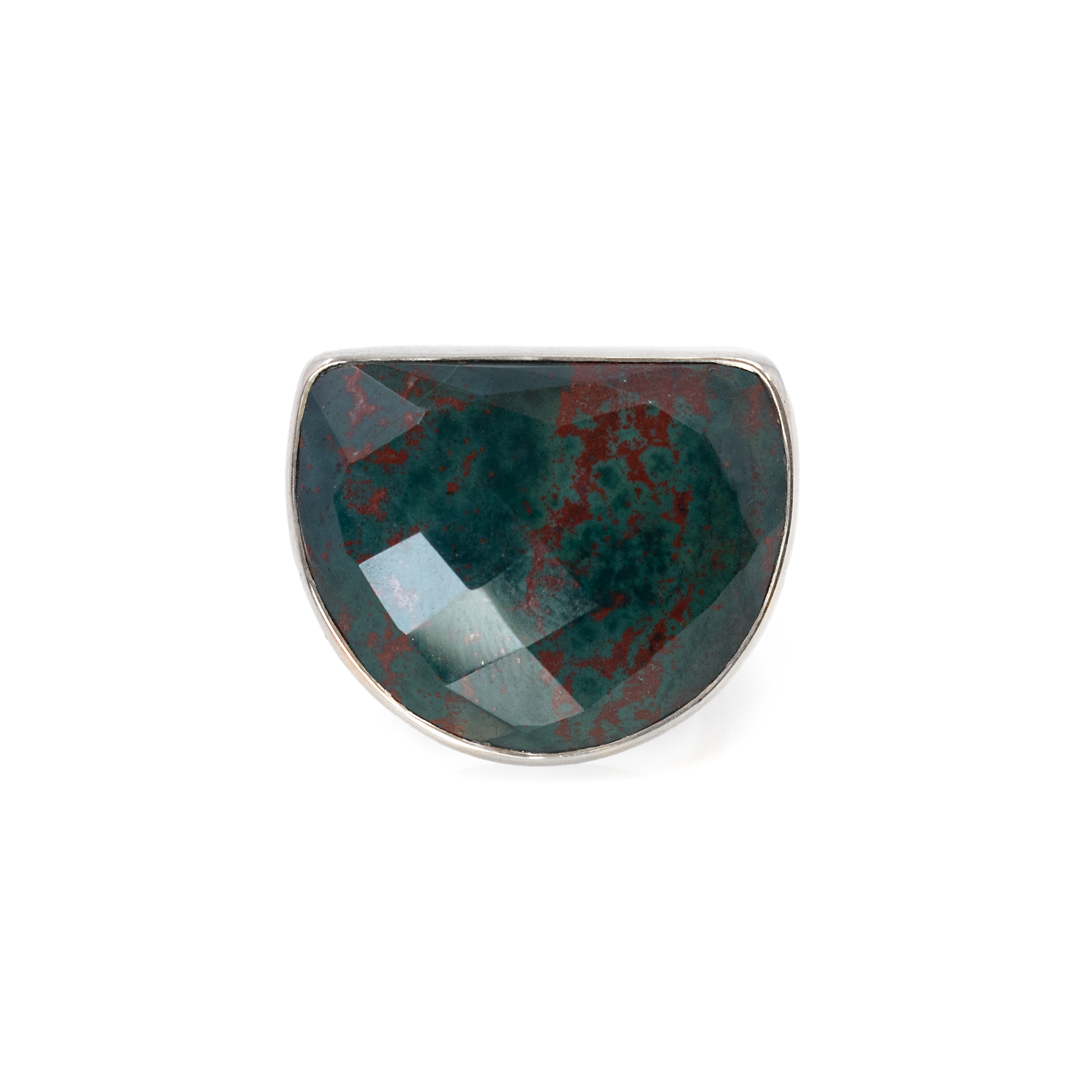 Elevate your jewelry collection with our stunning Bloodstone Ring, expertly crafted for those who appreciate the finer things in life. This exquisite piece features a mesmerizing bloodstone, renowned for its striking deep green color interspersed with vivid red specks, reminiscent of a captivating natural landscape.The bloodstone is skillfully cut into a diamond-faceted half circle, enhancing its natural beauty and giving off a dazzling play of light. Surrounding the stone is a sleek silver bezel setting, made from premium 925 sterling silver, which complements the rich tones of the bloodstone and provides both durability and elegance.Designed for versatility and comfort, this ring boasts an adjustable band, ensuring a perfect fit for any finger size. Whether you're dressing up for a special occasion or adding a touch of glamour to your everyday attire, this Bloodstone Ring effortlessly combines sophistication and style. Bloodstone Ring - Diamond Faceted Half Circle With Silver Bezel Szadj