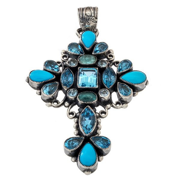 Closeup photo of Blue Topaz & Turquoise Cross Pendant With Silver Beading & Wiring With Flower Stamped Bail