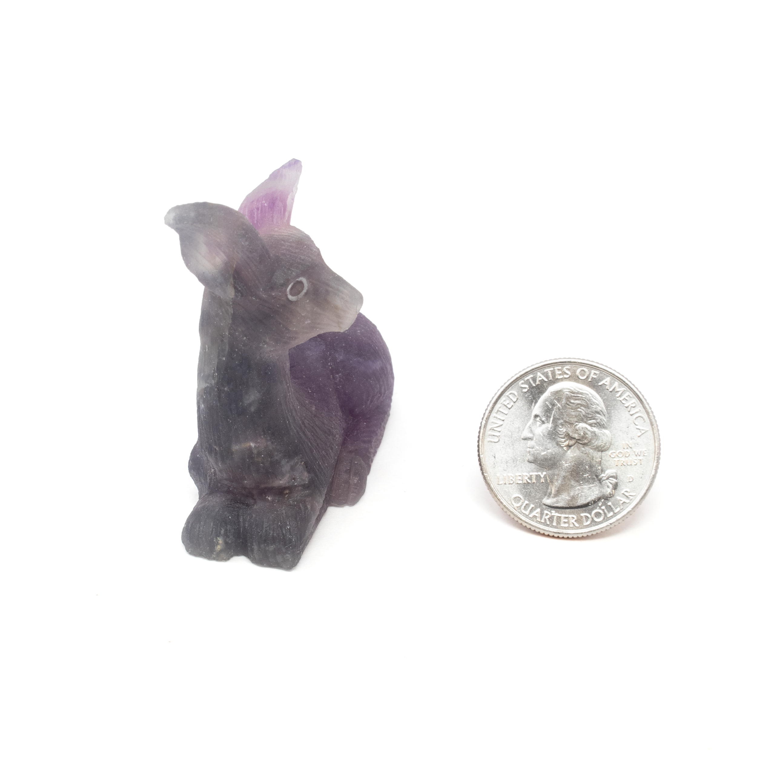 Unveil the mystical allure of nature with our exquisite Purple Fluorite Deer Carving, a masterful blend of natural artistry and spiritual symbolism. This captivating sculpture is expertly handcrafted from premium fluorite, renowned for its mesmerizing translucence and captivating hues ranging from soft lavenders to deep violets. Each piece is unique, showcasing the stone's natural banding and radiance, making it a cherished addition to any collection.Detailed craftsmanship brings the deer to life, capturing the grace and elegance of this majestic creature. Symbolic of gentleness, intuition, and regeneration, the deer is a powerful totem in many cultures, making this carving a deeply meaningful gift or personal treasure. Purple Fluorite Deer Carving